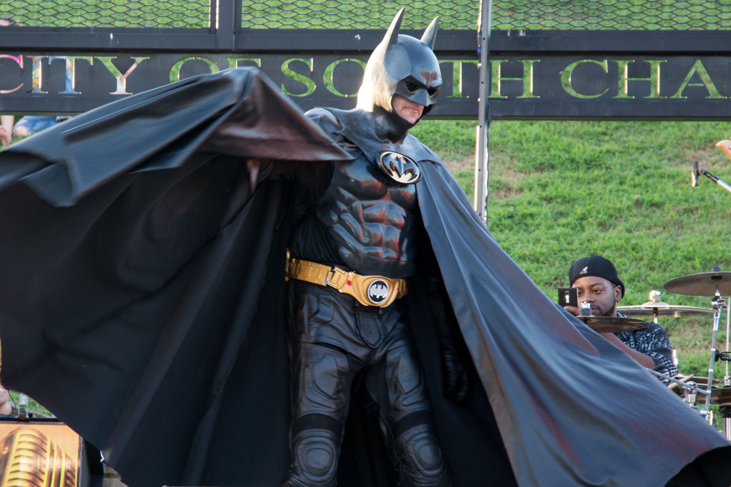 In this Aug. 15, 2015 photo provided by Linda Weekley, Leonard Robinson performs at SummerFest in South Charleston, W.Va. The Maryland man who delighted thousands of children by impersonating Batman at hospitals and charity events died when he was hit by a car while standing in the fast lane of Interstate 70, checking the engine of his custom-made Batmobile, police said Monday, Aug. 17, 2015. (Linda Weekley via AP)