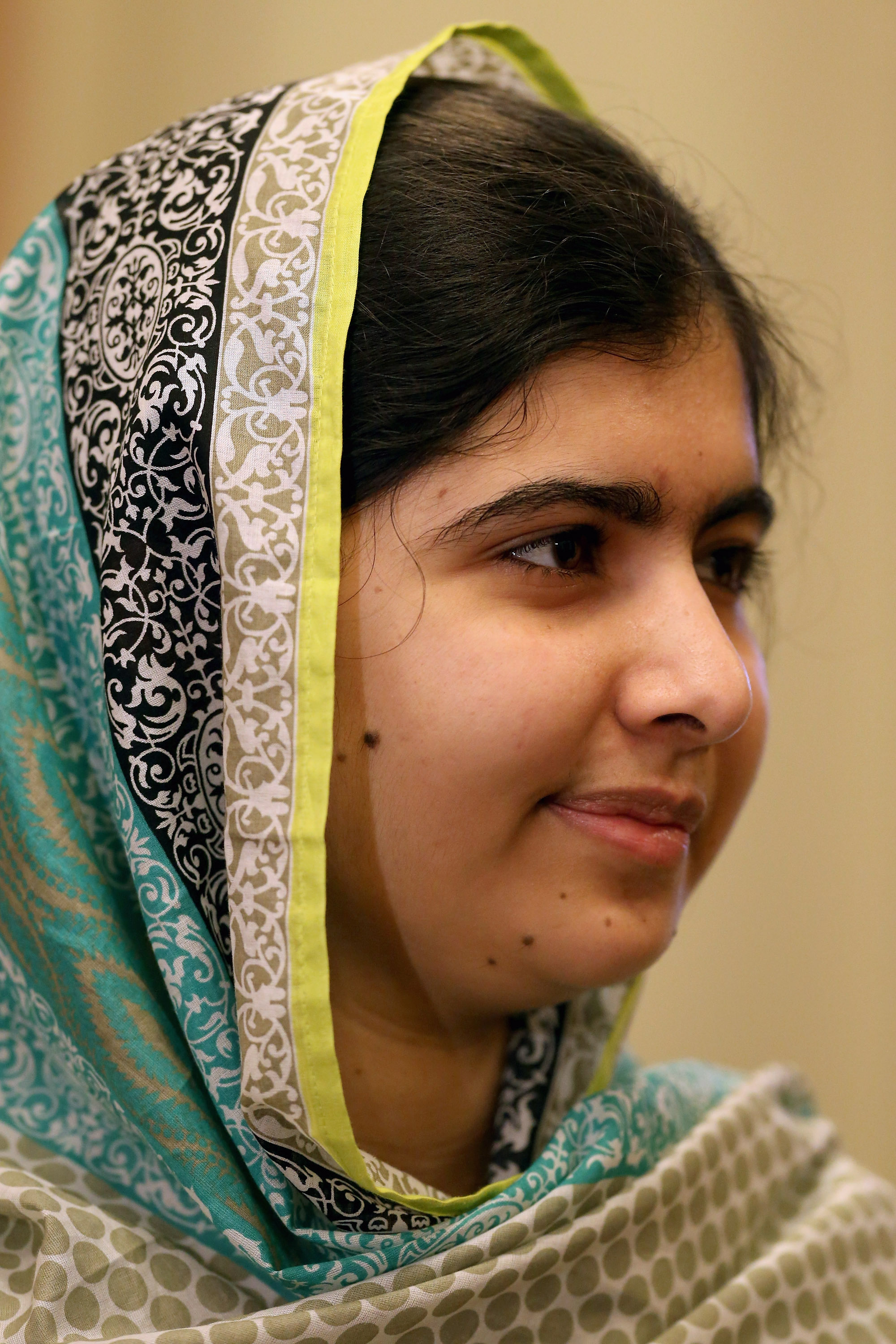 2014 Nobel Peace Prize Laureate Malala Yousafzai (L) poses for photographs before a meeting with Senate Minority Whip Richard Durbin (D-IL) about the importance of girls' education and the need for universal secondary education world-wide in his office at the U.S. Capitol June 23, 2015 in Washington, DC. (Chip Somodevilla—Getty Images)