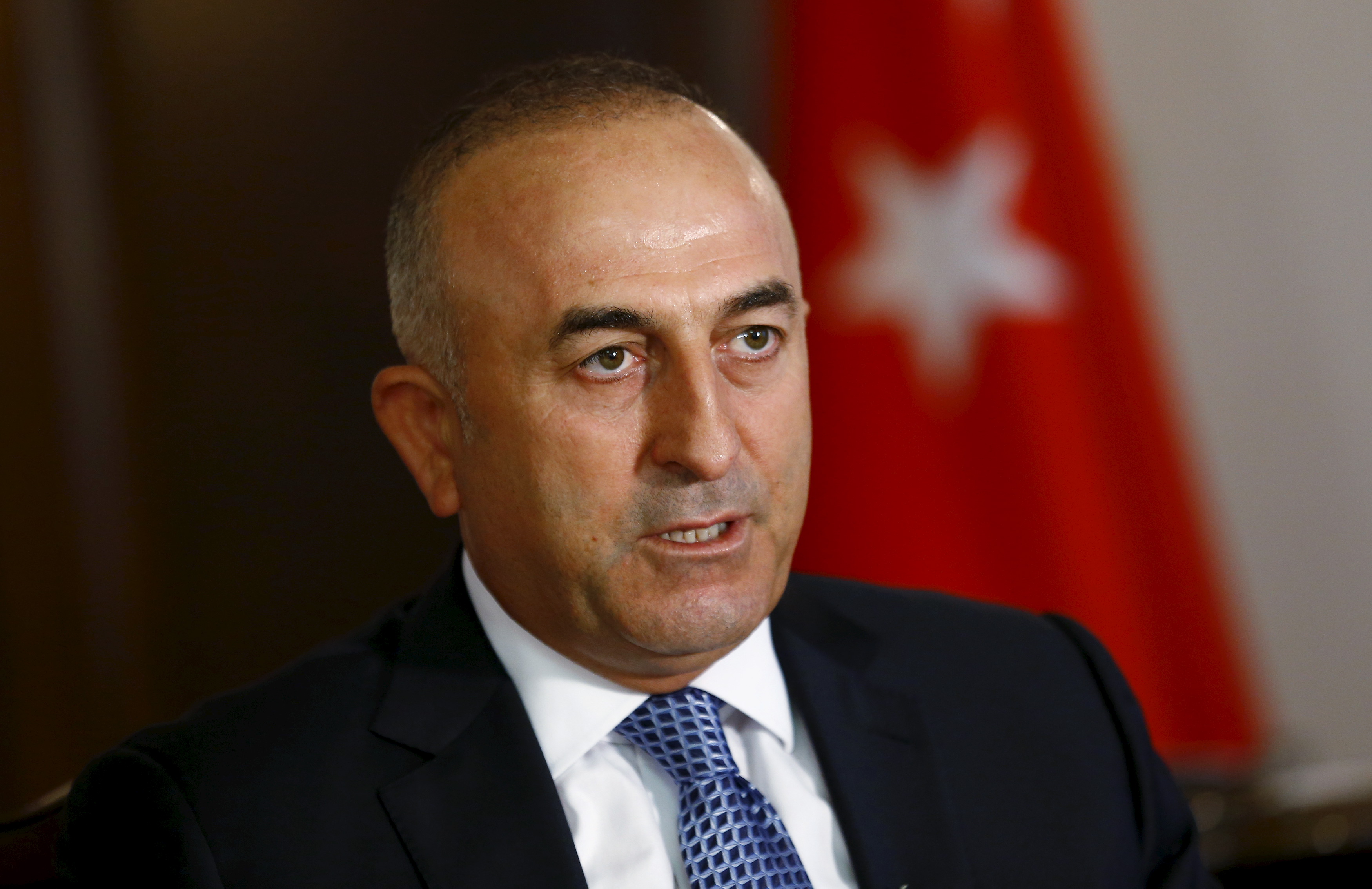 Turkey's Foreign Minister Mevlut Cavusoglu answers a question during an interview with Reuters in Ankara, Turkey, August 24, 2015.