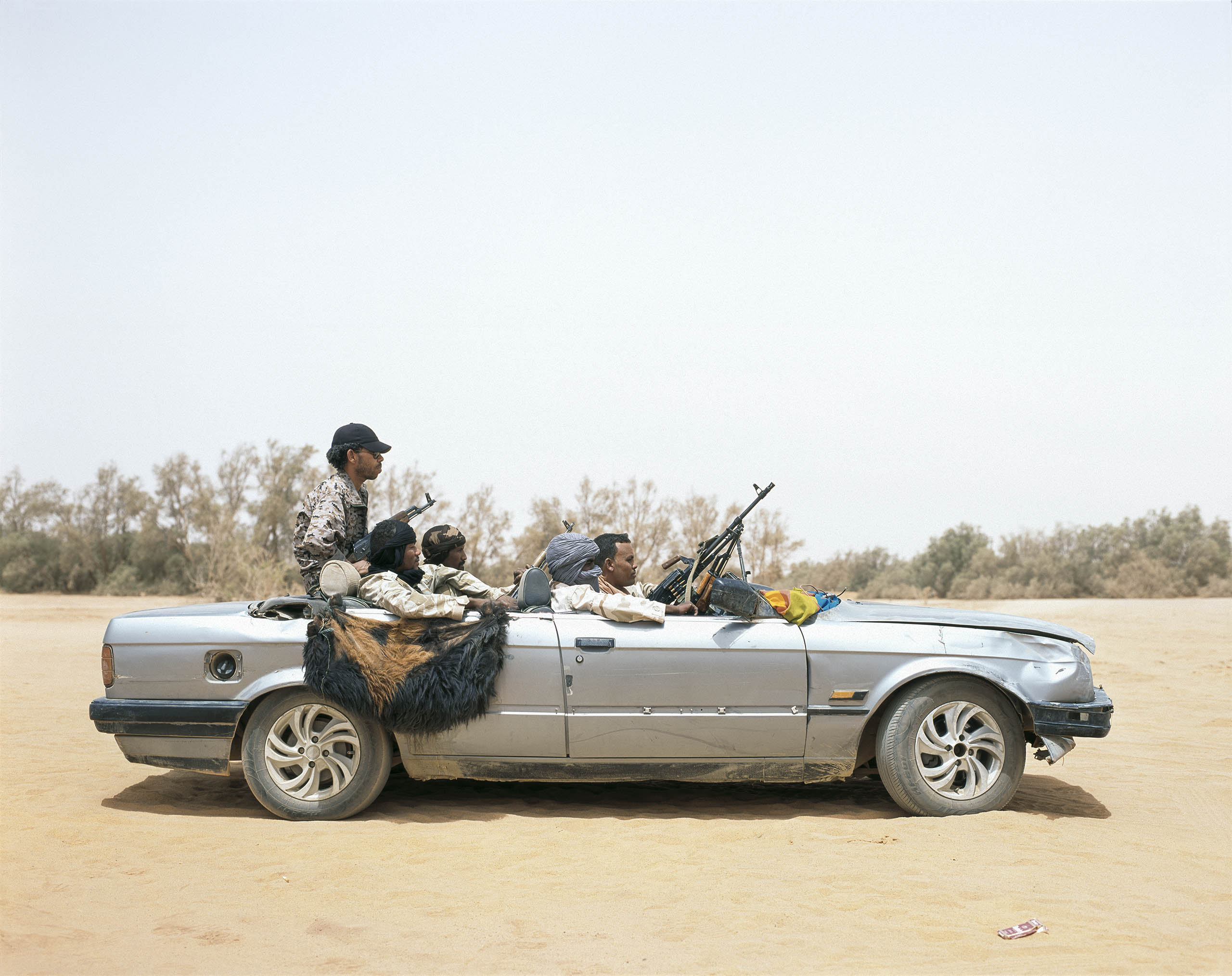 Soldiers from the Tuareg tribe on patrol in Ubari, which has gone from being a garrison town to a violent hub for smuggling.