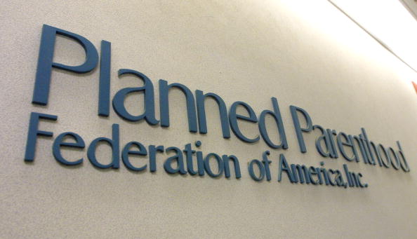 A sign hangs in the offices of the Planned Parenthood Federation of America in New York City. (Mario Tama—Getty Images)