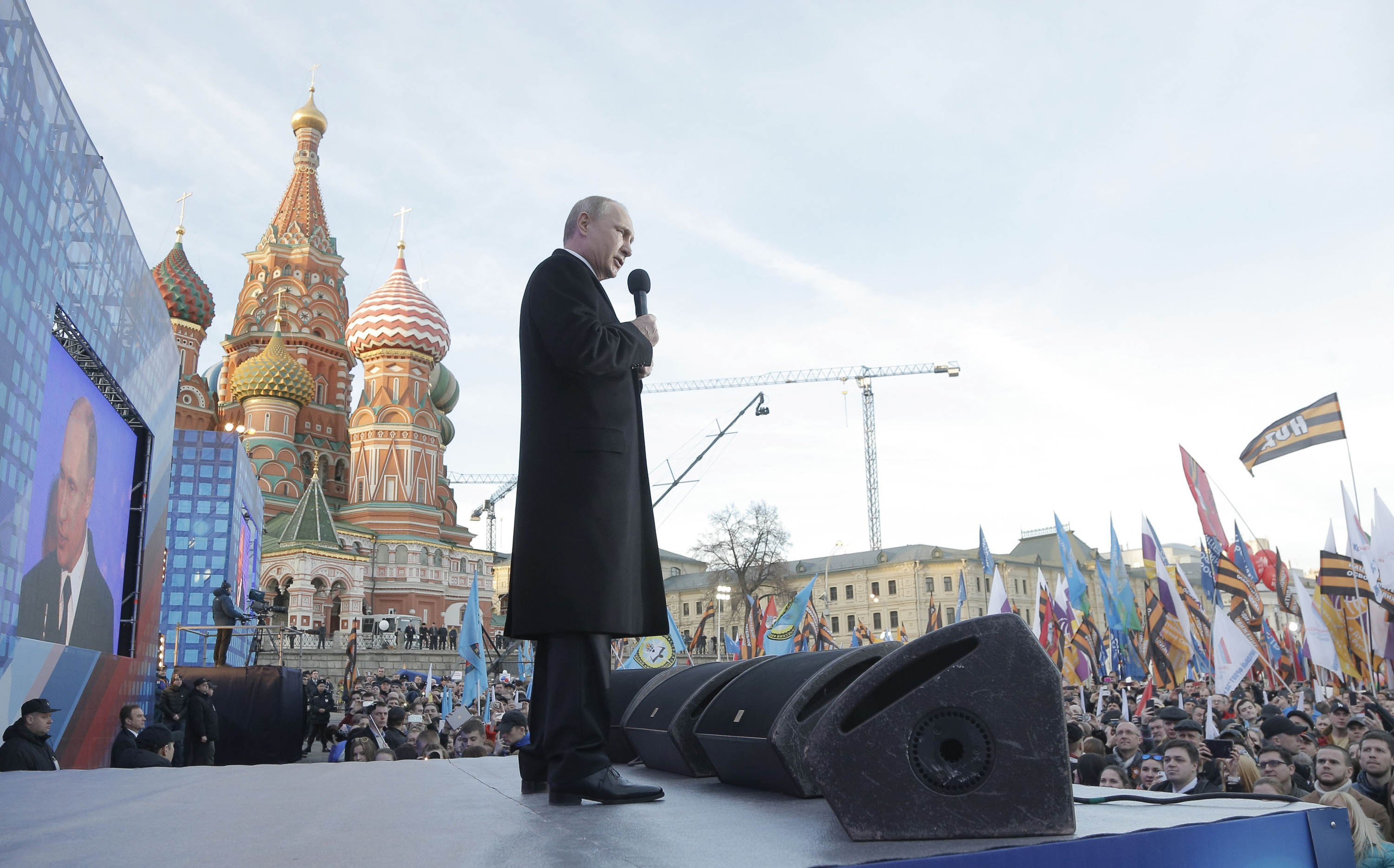 Putin speaks in Moscow in March at an event marking the first anniversary of the takeover of Crimea. (Maxim Shipenkov—The New York Times/Redux)