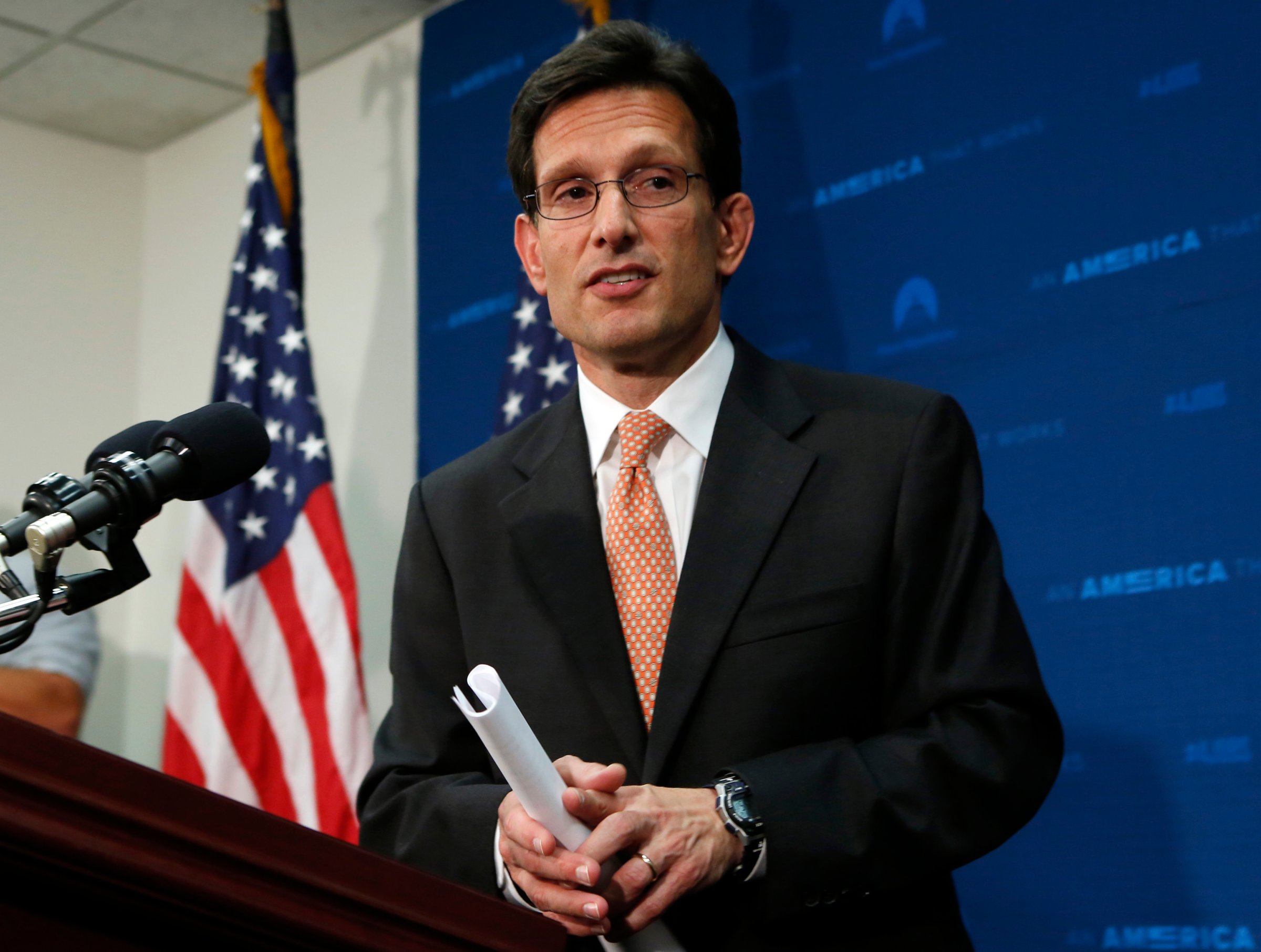 House Majority Leader Cantor leaves after a news conference