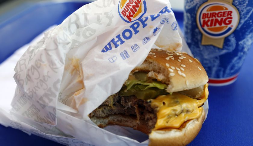 Half-eaten Burger King hamburger is seen in this picture illustration taken at the fast food restaurant chain's branch in Hanau