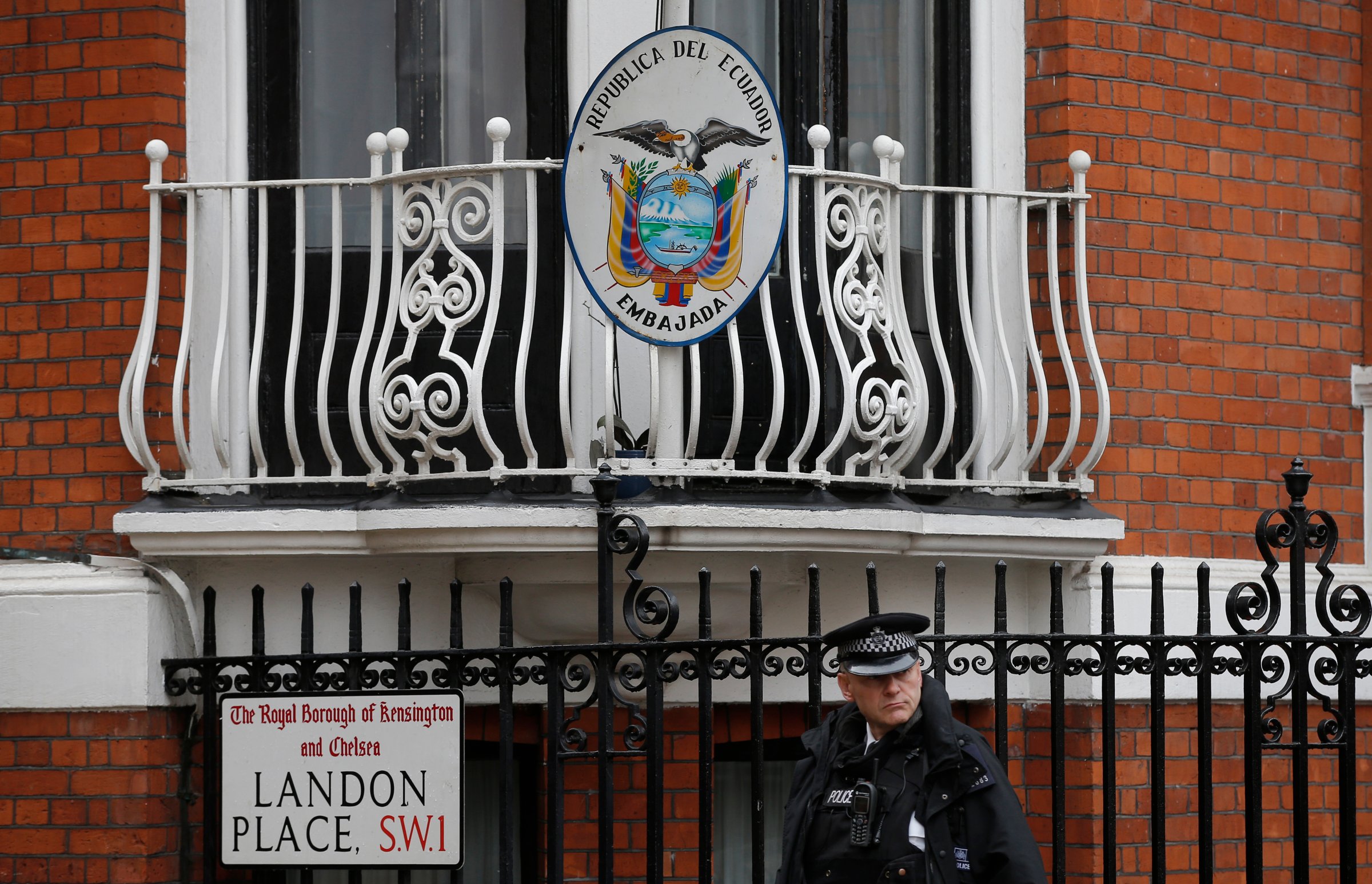 A police officer stands outside the Ecuadorian embassy in London