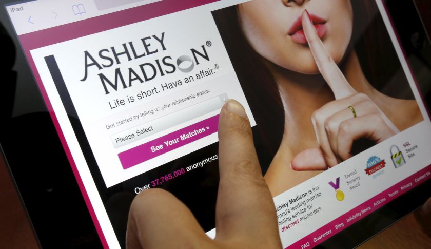 Homepage of Ashley Madison website displayed on iPad, in photo illustration taken in Ottawa