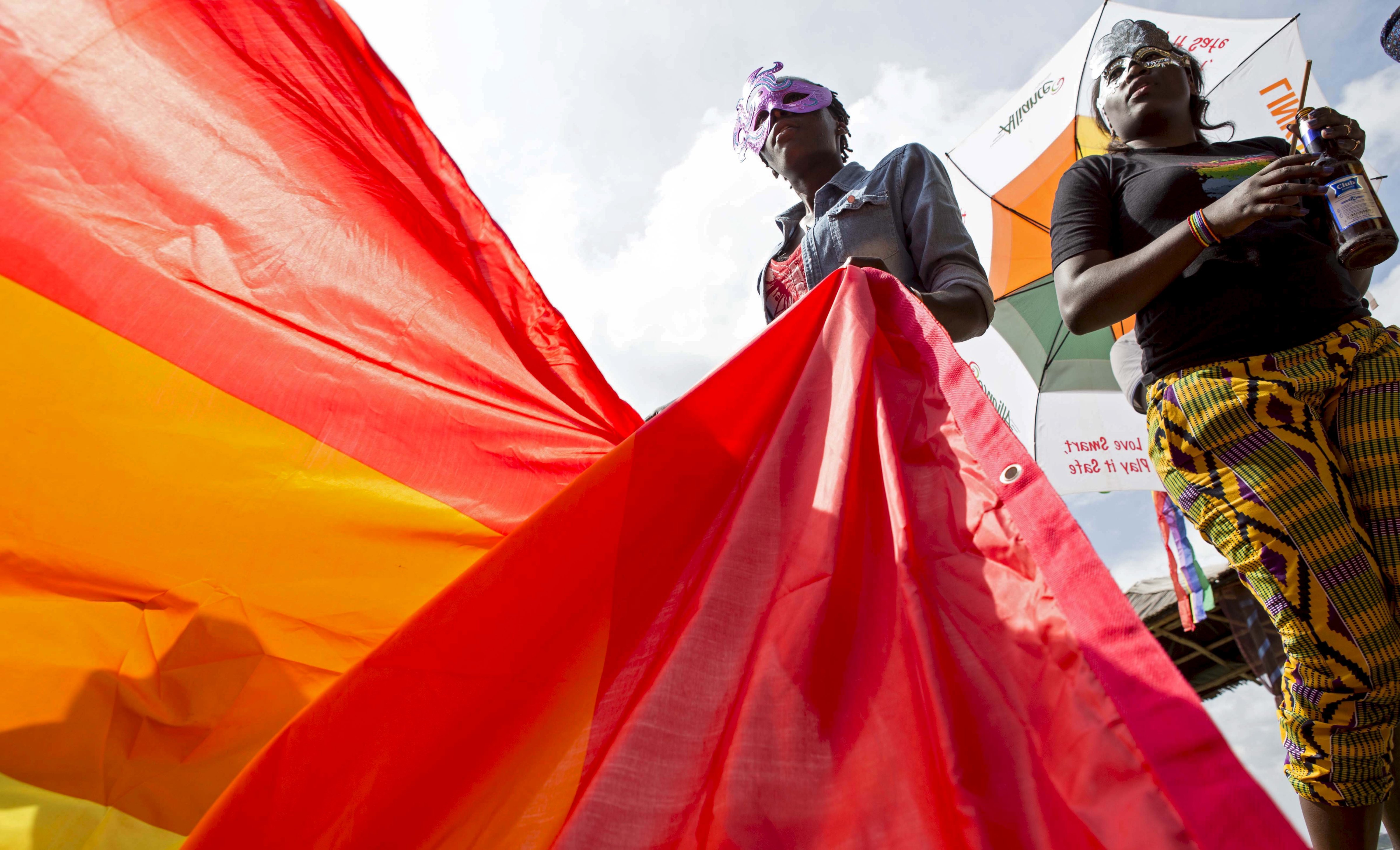 Members of the lesbian, gay, bisexual and transgender (LGBT) community parade in Entebbe, southwest of the Ugandan capital Kampala, on Aug. 8, 2015 (Edward Echwalu—Reuters)
