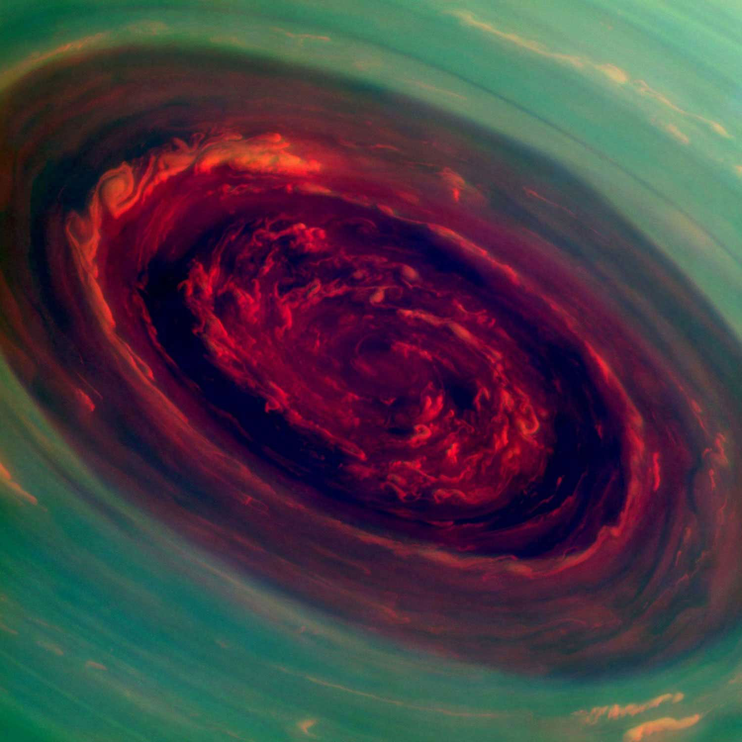 The spinning vortex of Saturn's north polar storm resembles a deep red rose of giant proportions surrounded by green foliage in this false-color image from NASA's Cassini spacecraft. Measurements have sized the eye at a staggering 1,250 miles (2,000 kilometers) across with cloud speeds as fast as 330 miles per hour (150 meters per second).This image is among the first sunlit views of Saturn's north pole captured by Cassini's imaging cameras. When the spacecraft arrived in the Saturnian system in 2004, it was northern winter and the north pole was in darkness. Saturn's north pole was last imaged under sunlight by NASA's Voyager 2 in 1981; however, the observation geometry did not allow for detailed views of the poles. Consequently, it is not known how long this newly discovered north-polar hurricane has been active.The images were taken with the Cassini spacecraft narrow-angle camera on Nov. 27, 2012, using a combination of spectral filters sensitive to wavelengths of near-infrared light. The images filtered at 890 nanometers are projected as blue. The images filtered at 728 nanometers are projected as green, and images filtered at 752 nanometers are projected as red. In this scheme, red indicates low clouds and green indicates high ones.The view was acquired at a distance of approximately 261,000 miles (419,000 kilometers) from Saturn and at a sun-Saturn-spacecraft, or phase, angle of 94 degrees. Image scale is 1 mile (2 kilometers) per pixel. The Cassini-Huygens mission is a cooperative project of NASA, the European Space Agency and the Italian Space Agency. NASA's Jet Propulsion Laboratory, a division of the California Institute of Technology in Pasadena, manages the mission for NASA's Science Mission Directorate, Washington, D.C. The Cassini orbiter and its two onboard cameras were designed, developed and assembled at JPL. The imaging operations center is based at the Space Science Institute in Boulder, Colo.For more information about the Cassini-Huygens