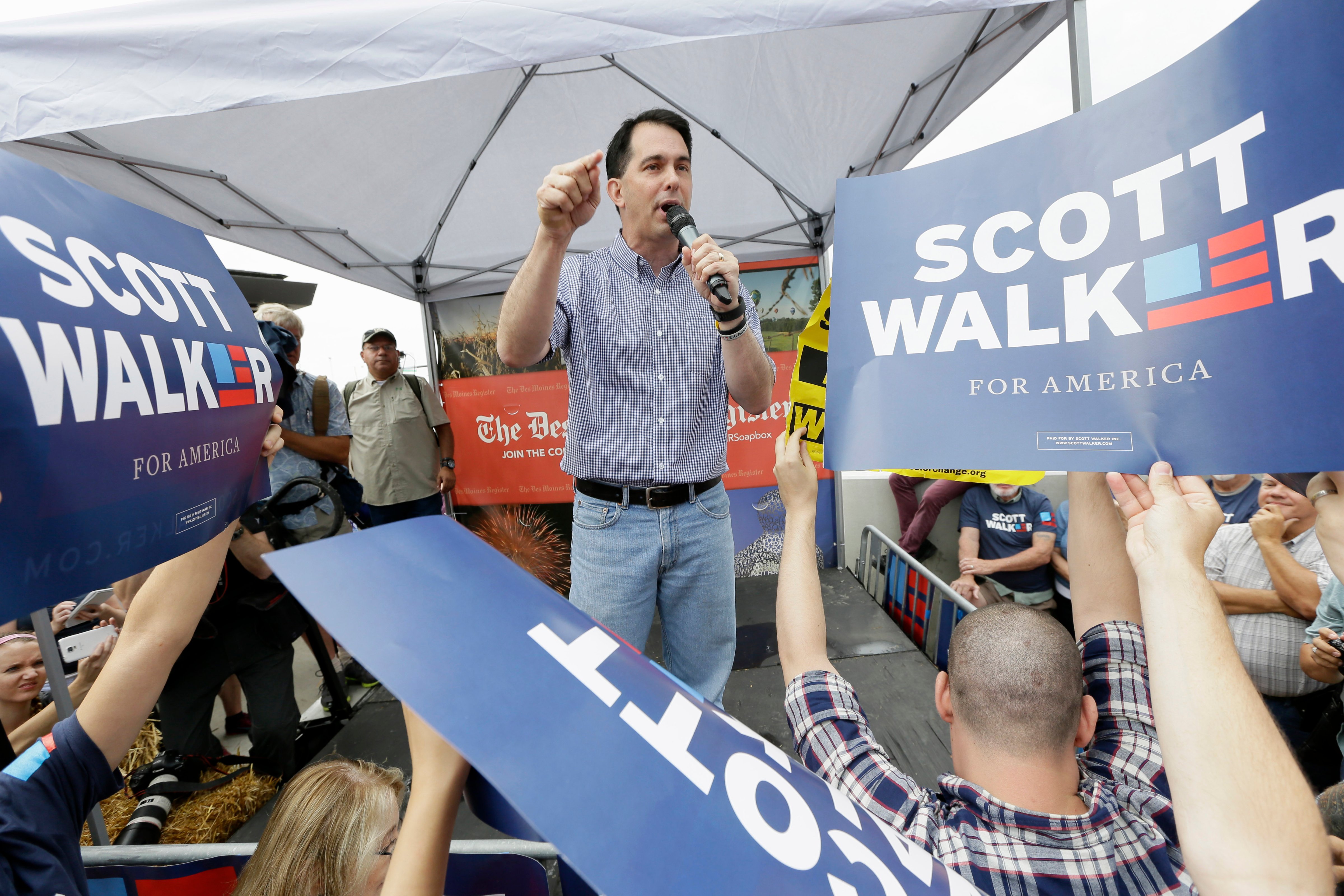 Republican presidential candidate, Wisconsin Gov. Scott Walker, speaks during a visit to the Iowa State Fair on Aug. 17, 2015, in Des Moines, Iowa. (Charlie Neibergall—AP)