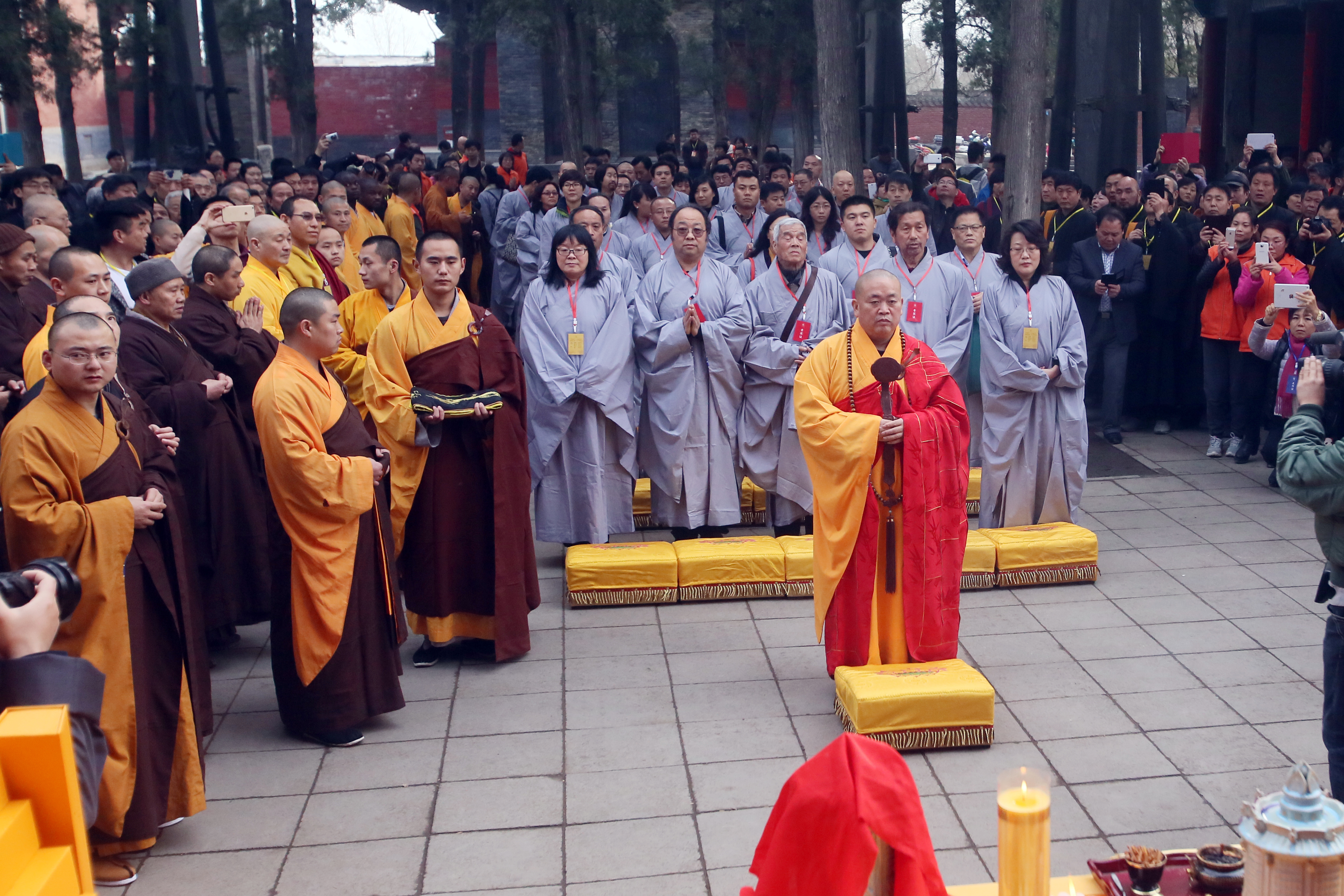 Shi Yongxin of Shaolin Temple presides over the "Ten Thousand People Copy Confucian Classics" launching ceremony on Dragon Heads-raising Day on March 21, 2015 in Zhengzhou, Henan province of China. (ChinaFotoPress/Getty Images)