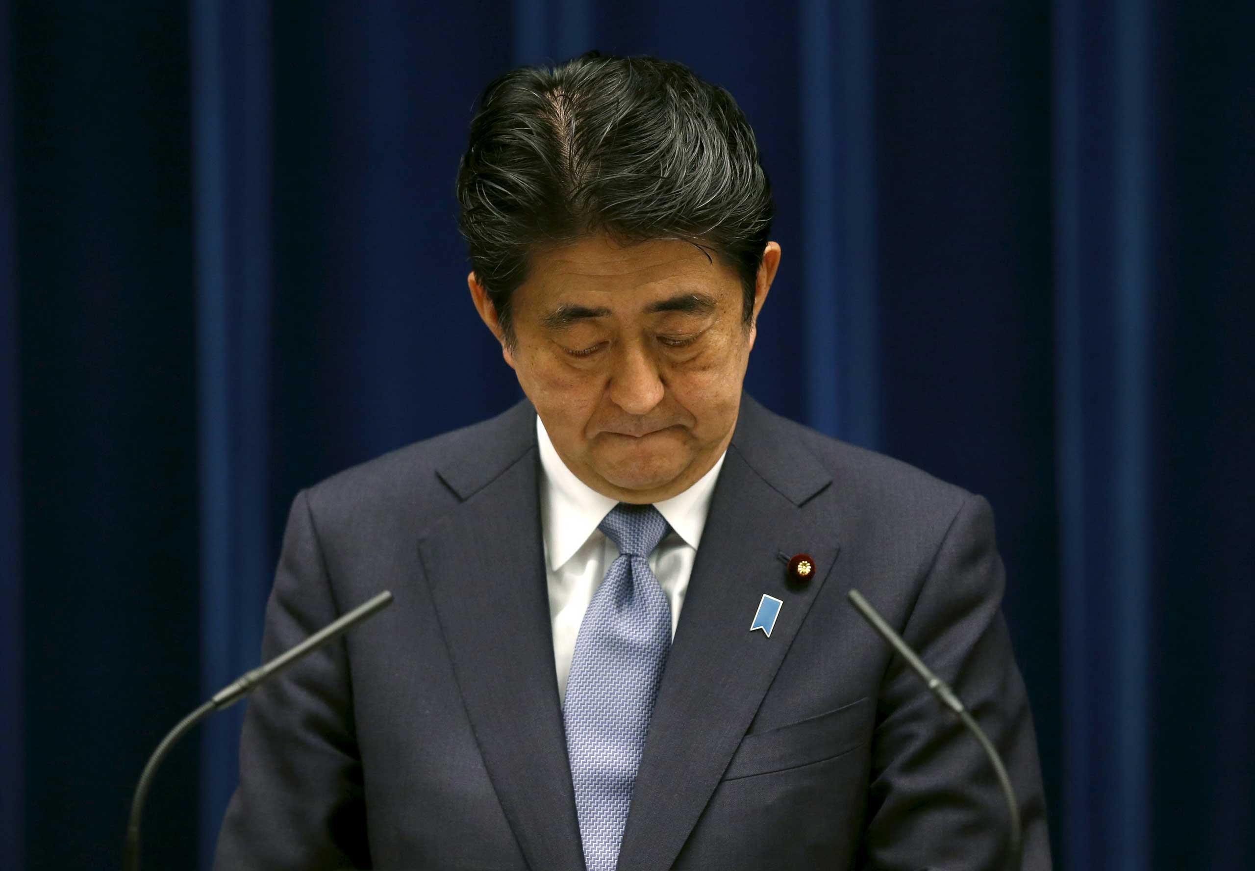 Japan's Prime Minister Shinzo Abe attends a news conference to deliver a statement marking the 70th anniversary of World War Two's end, at his official residence in Tokyo Aug. 14, 2015. (Toru Hanai—Reuters)
