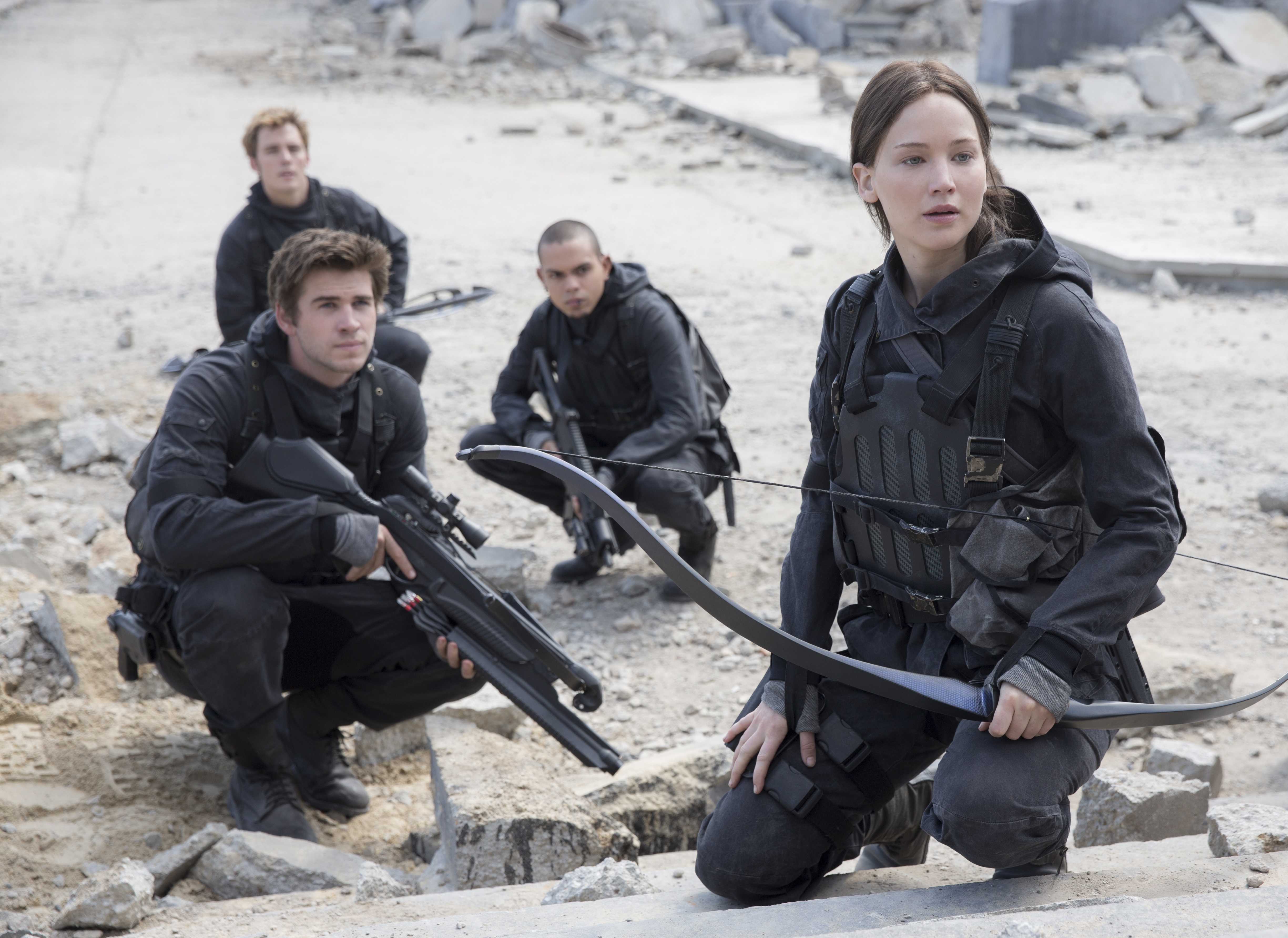 Evan Ross, Jennifer Lawrence, Liam Hemsworth and Sam Claflin in The Hunger Games: Mockingjay - Part 2.