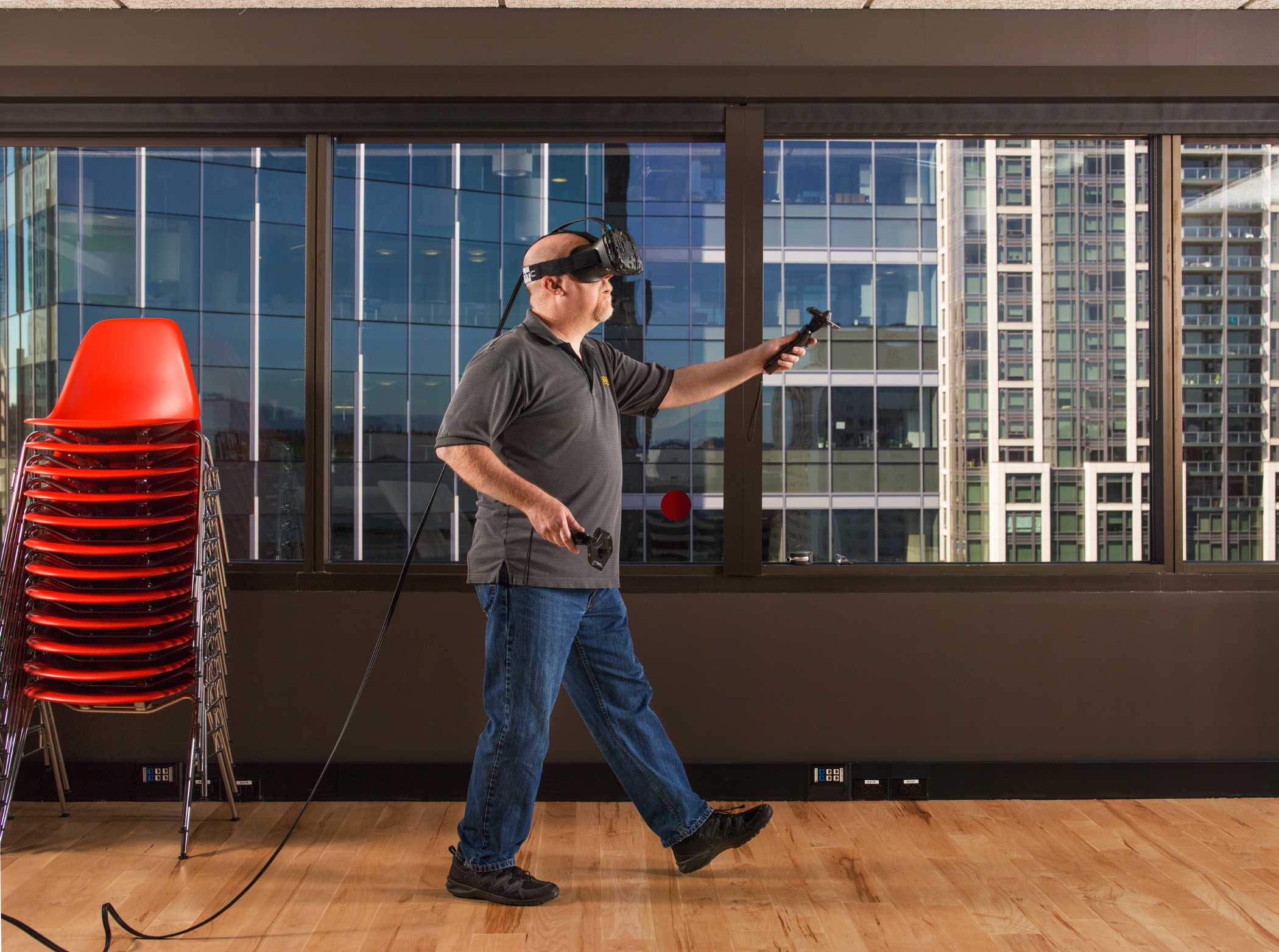 Ken Birdwell, an engineer from valve demonstrates the Vive virtual reality headset at the valve hq in Seattle, WA on June 25, 2015.