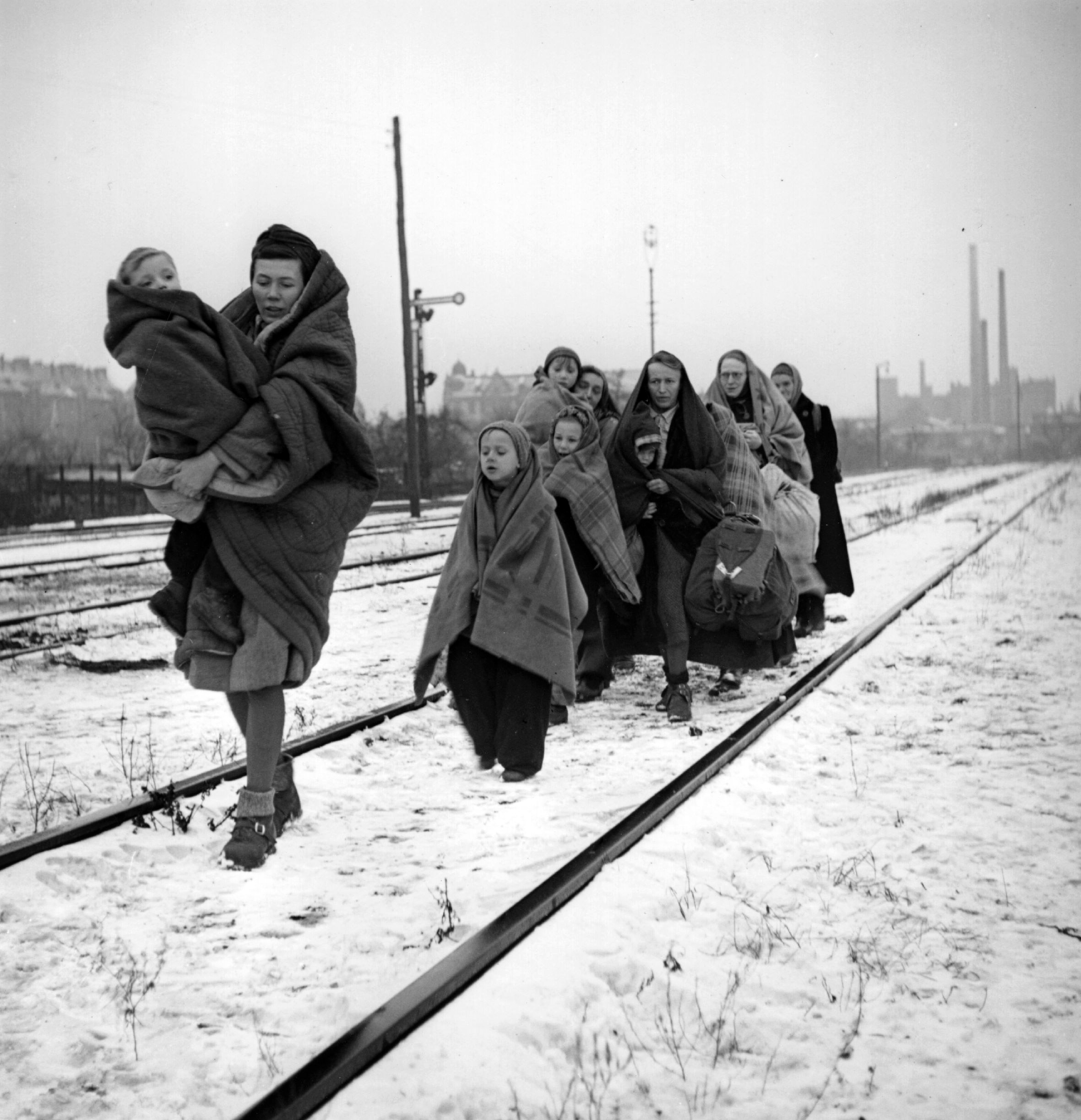 A handful of survivors from the 150 refugees who left Lodz in Poland two months earlier headed for Berlin. They are following railway lines on the outskirts of Berlin in the hope of being picked up by a British train.