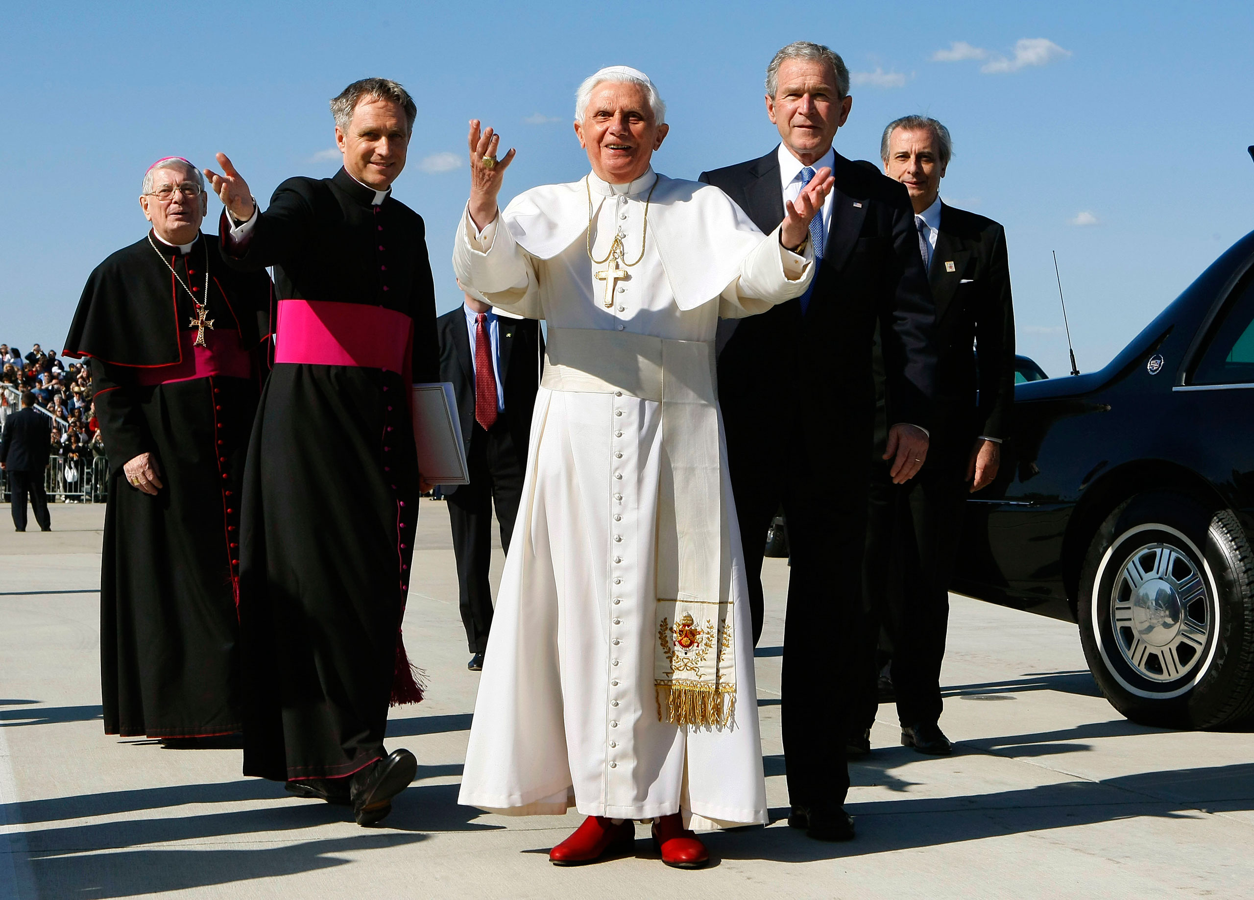 Pope Benedict XVI  reacts to the cheering crowd as he stands with George W. Bush upon his arrival at Andrews Air Force Base, April 15, 2008 in Camp Springs, Md.
