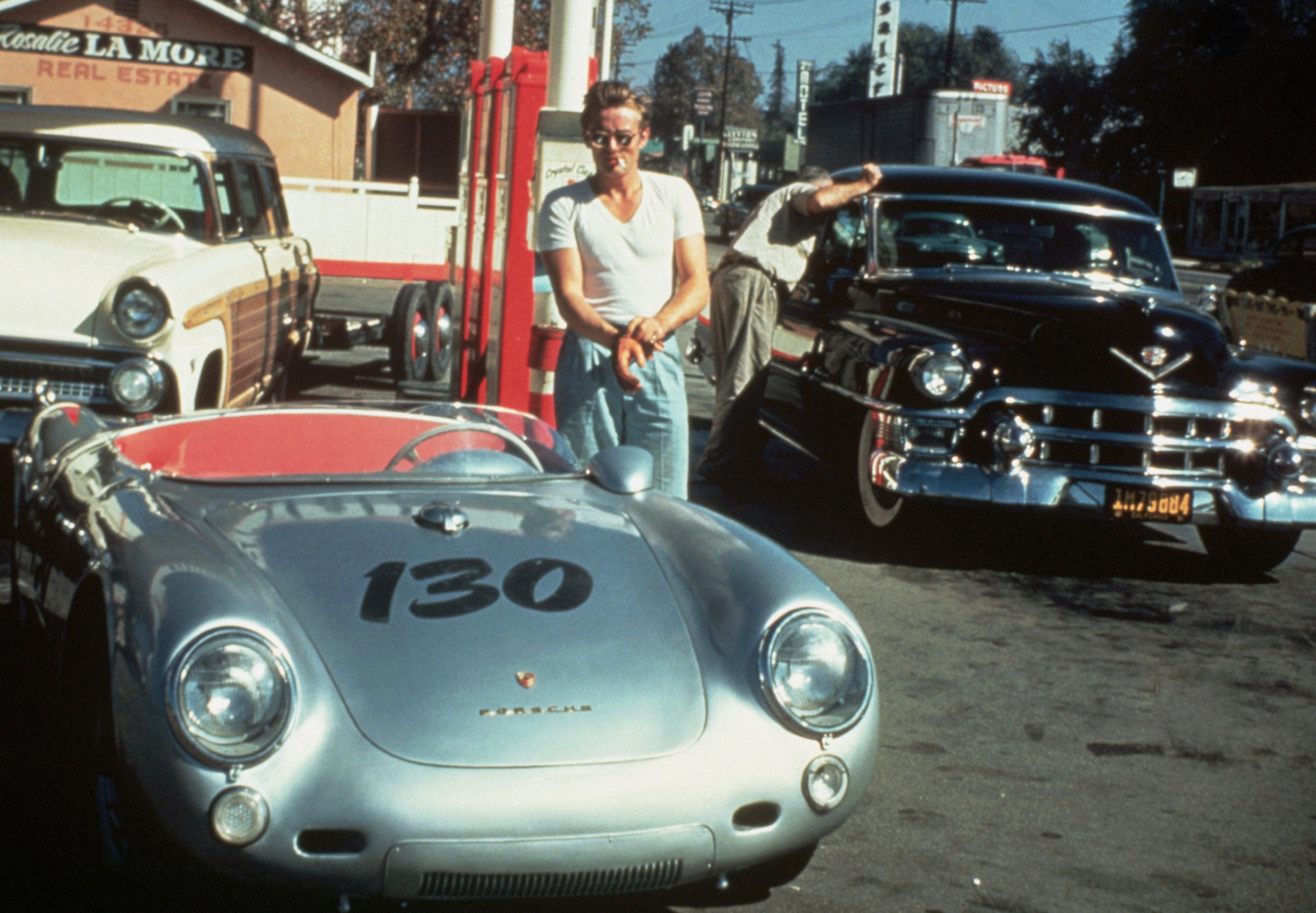 James Dean at a gas station with his silver Porsche 550 Spyder he named Little Bastard, just hours before his fatal crash. September 30, 1955.