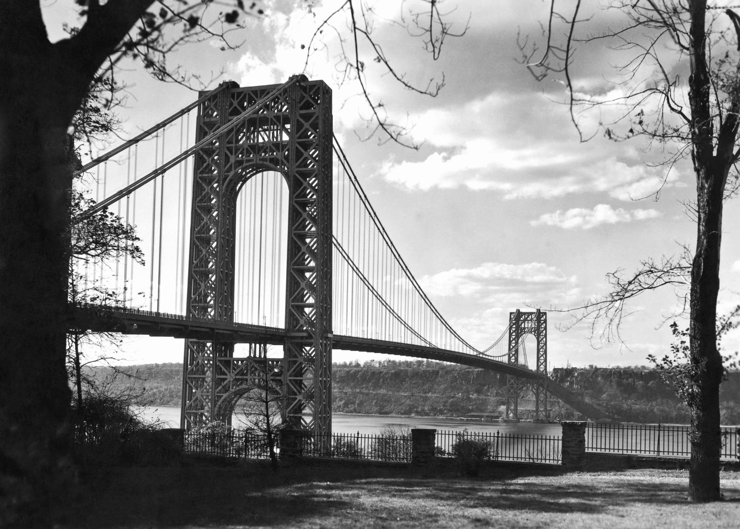 View of the George Washington Bridge from Washington Heights in Manhattan across to Fort Lee in New Jersey, New York, New York, 1932.