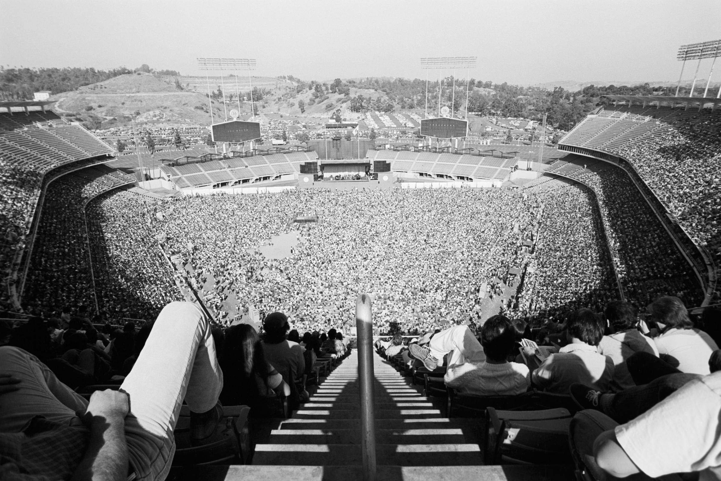 “I had to climb to the top of the stadium to see what it looked like filled with that many people.” – Terry O’Neill