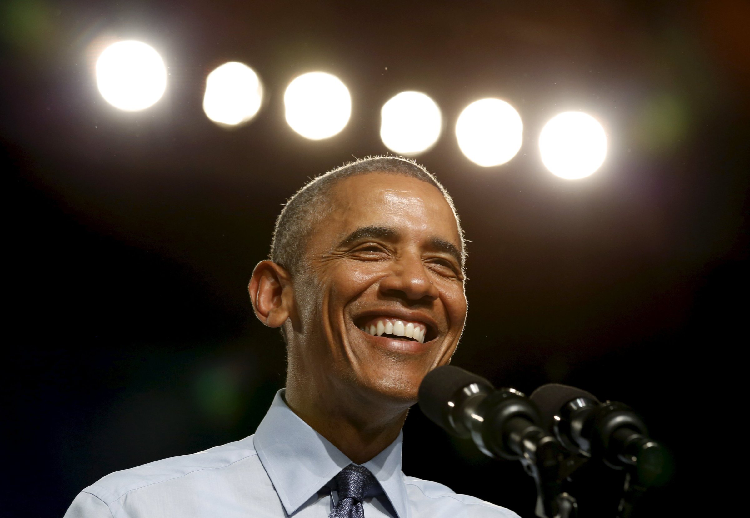 U.S. President Barack Obama smiles while speaking during a visit to Macomb  Community College in Warren
