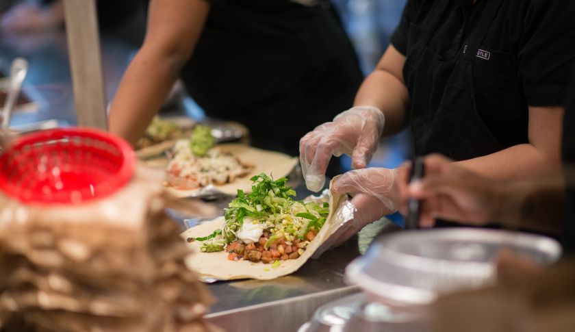 Employees prepare lunch orders at a Chipotle Mexican Grill restaurant in New York. (Bloomberg&mdash;Bloomberg via Getty Images)