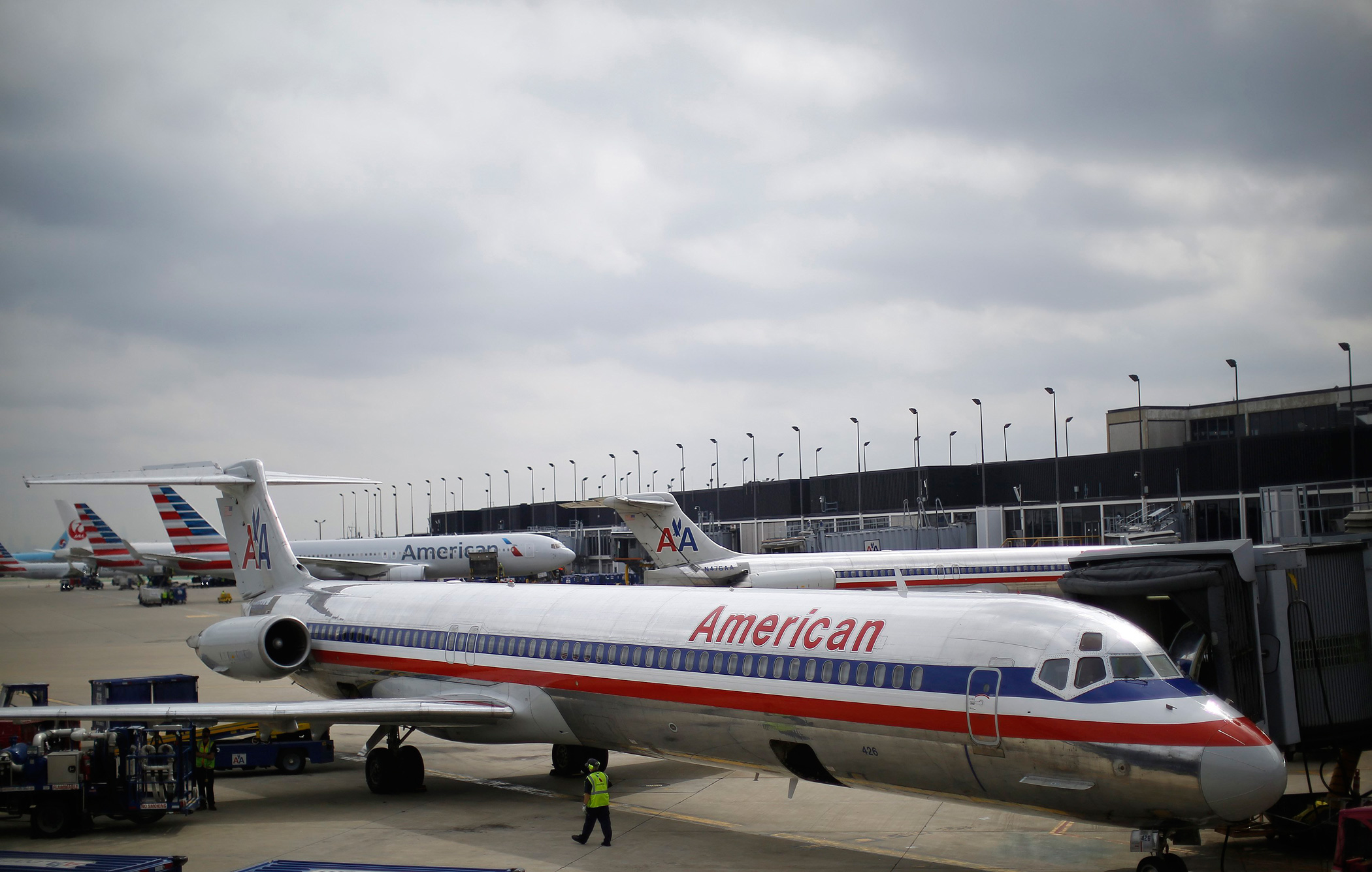 An American Airlines airplane sits at a gate at the O'Hare Airport in Chicago, Illinois
