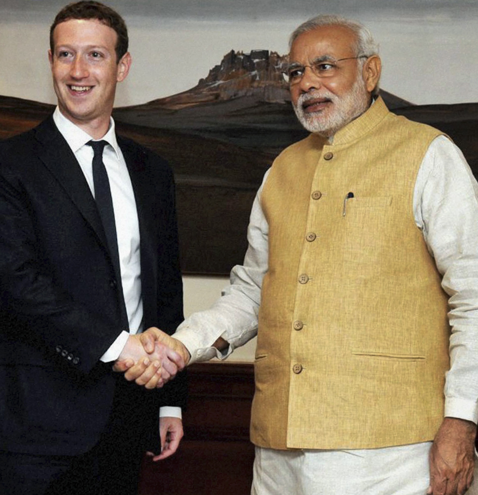 Indian Prime Minister Narendra Modi, right, shakes hands with Facebook CEO Mark Zuckerberg during a meeting in New Delhi on Oct. 10, 2014 (AP&mdash;AP)