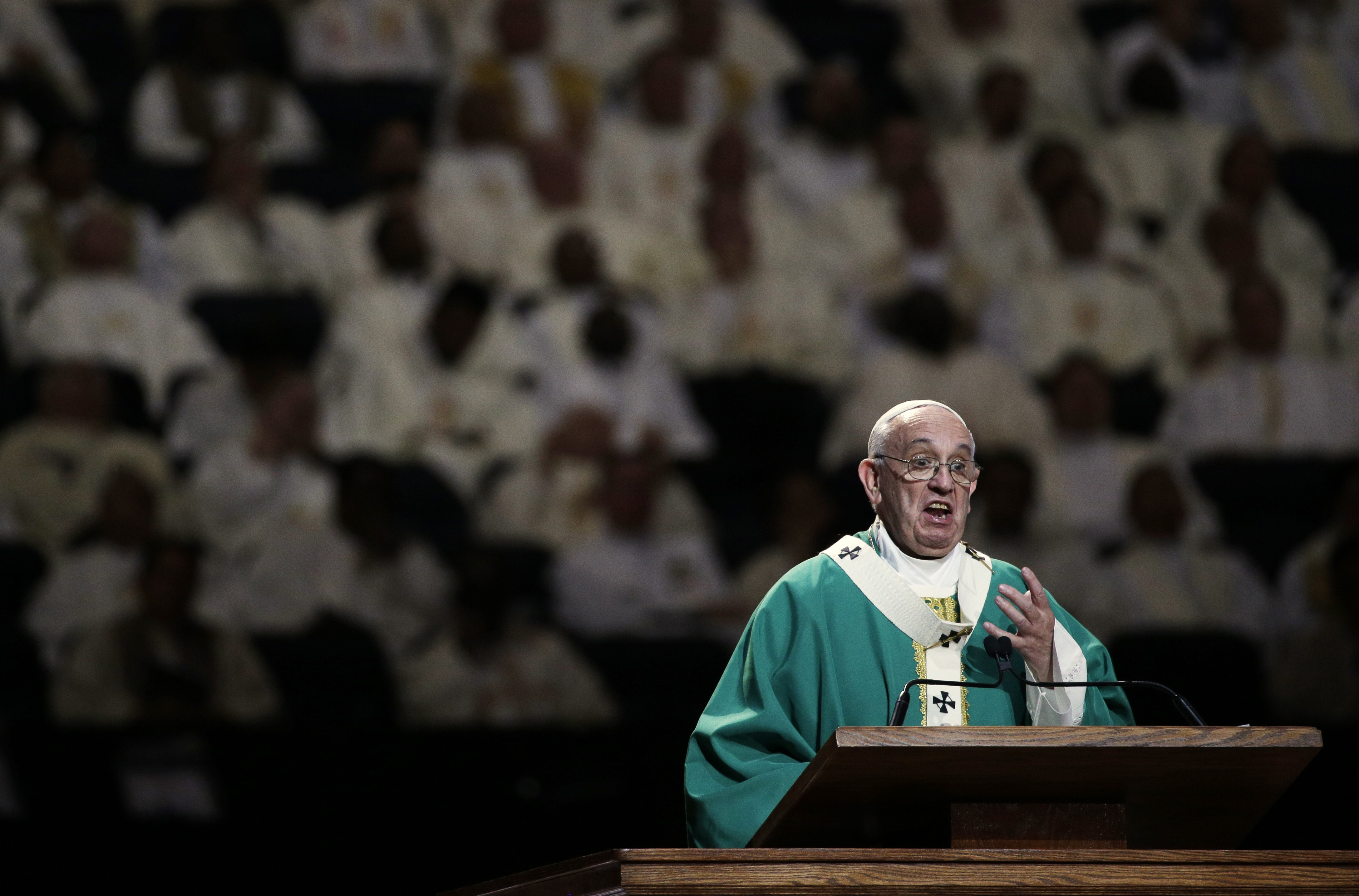 Pope Francis reads his homily while celebrating high Mass at Madison Square Garden, on Sept. 25, 2015 in New York City.