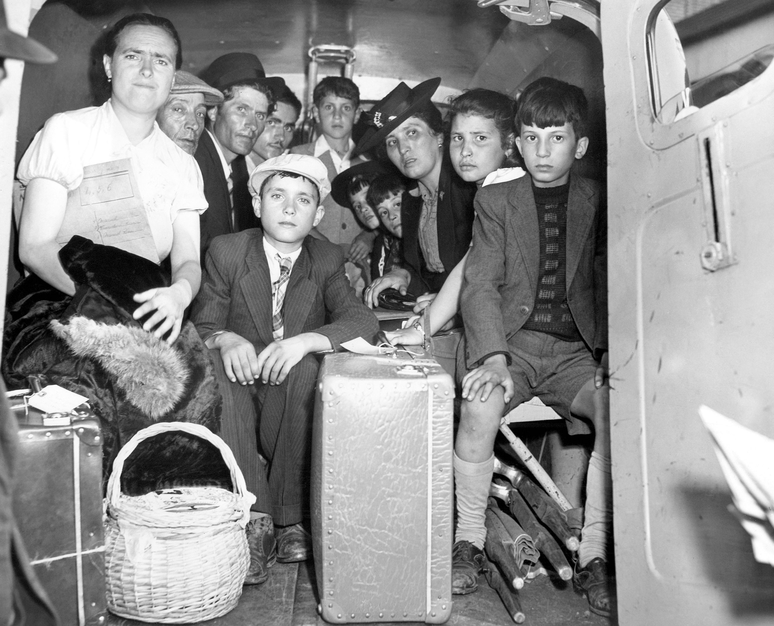 Group of passengers from the Portuguese ship Serpa Pinto, which was stopped by a German submarine and ordered abandoned off Bermuda, are shown after their arrival in Philadelphia, May 31, 1944. The U-boat officers abandoned plans to sink the vessel and permitted the passengers to re-board her after receiving wireless orders from Berlin.