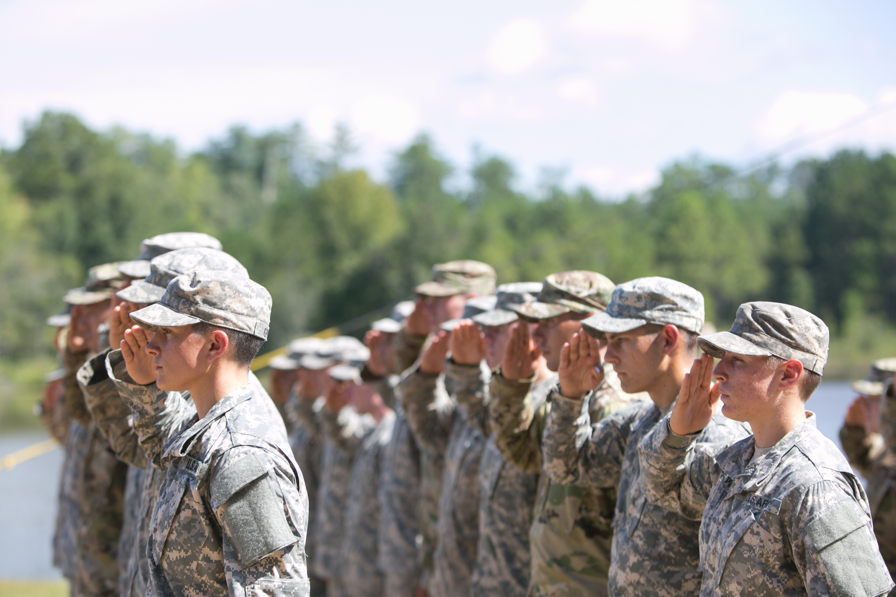 Capt. Kristen Griest (L) and 1st Lt.  Shaye Haver (R) salute during the graduation ceremony of the United States Army's Ranger School at Fort Benning, Georgia on Aug. 21, 2015.  Griest and Haver are the first females to graduate from the Army's intensive Ranger School. (Jessica McGowan—Getty Images)