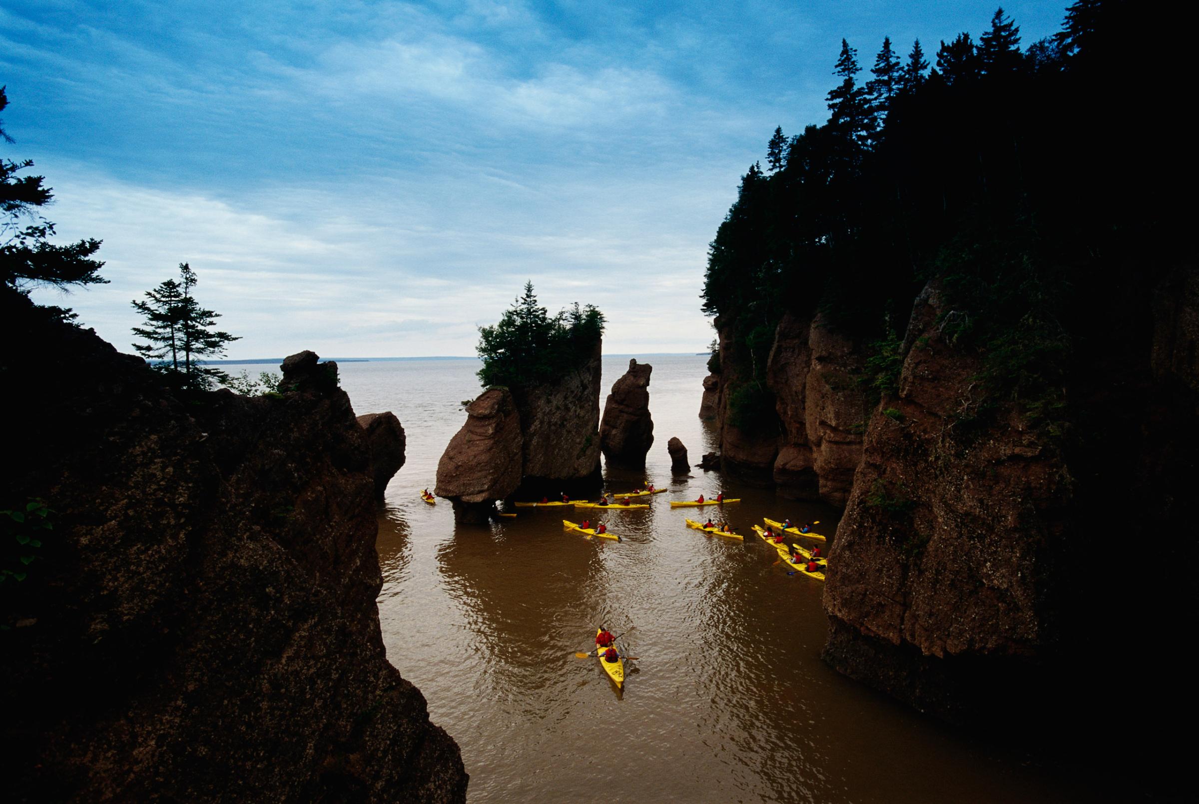 ca. 2002, New Brunswick, Canada, Canada --- Kayakers in the Bay of Fundy --- Image by © Richard T. Nowitz/CORBIS