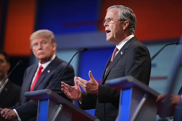 Former Florida Gov. Jeb Bush and real estate mogul Donald Trump at the first Republican debate on August 6, 2015 in Cleveland, Ohio. (Scott Olson—2015 Getty Images)