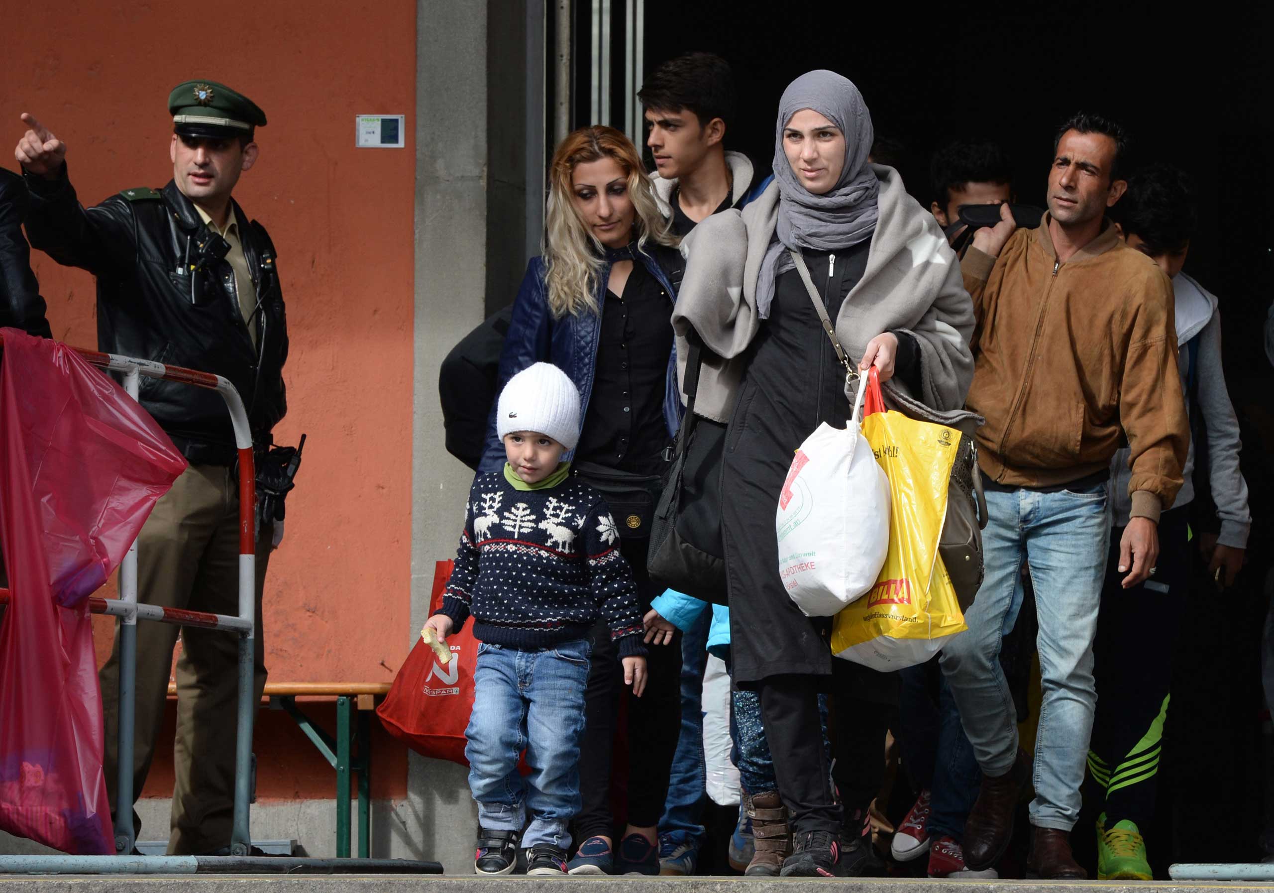 Refugee's arrive in front of the main train station in Munich, southern Germany, September 7, 2015. (Christof Statche—AFP/Getty Images)