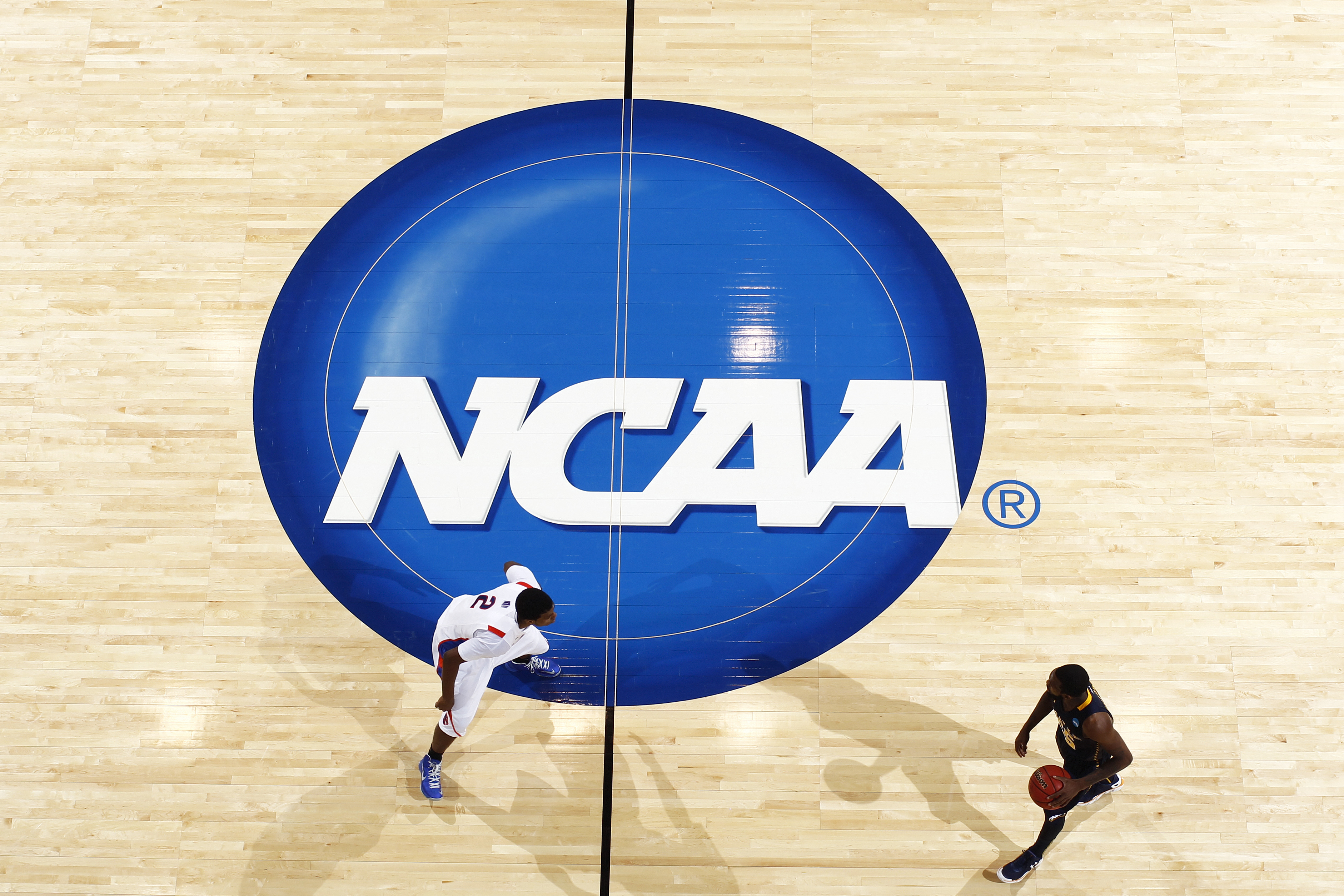 General view of the NCAA logo on the floor during action at University of Dayton Arena on March 20, 2013 in Dayton, Ohio. (Joe Robbins—Getty Images)