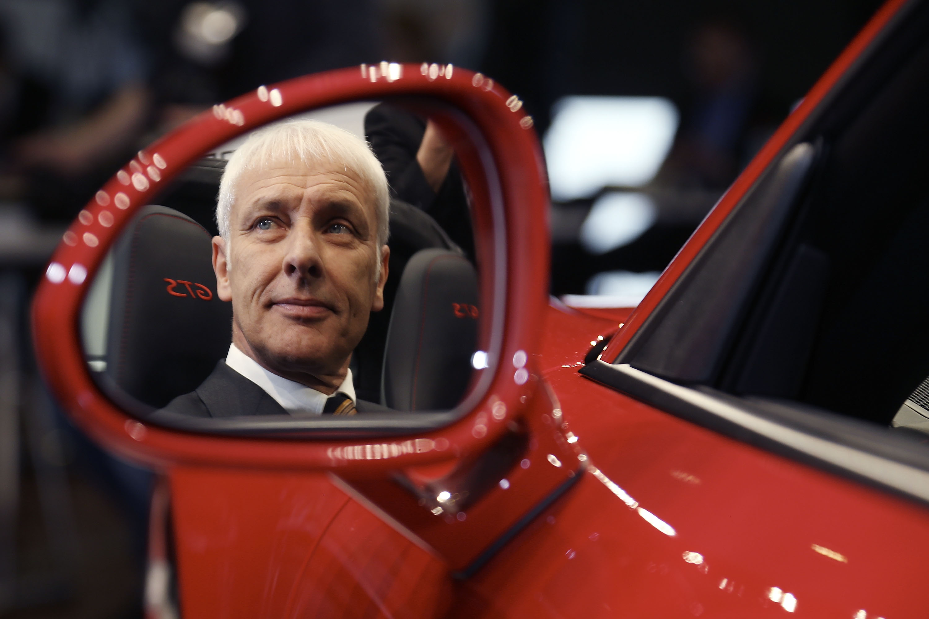 Matthias Mueller, CEO of Porsche AG poses in a Porsche Targa 4 GTS at the Porsche AG annual press conference in Stuttgart, Germany, on March 13, 2015. (Thomas Niedermueller—Getty Images)