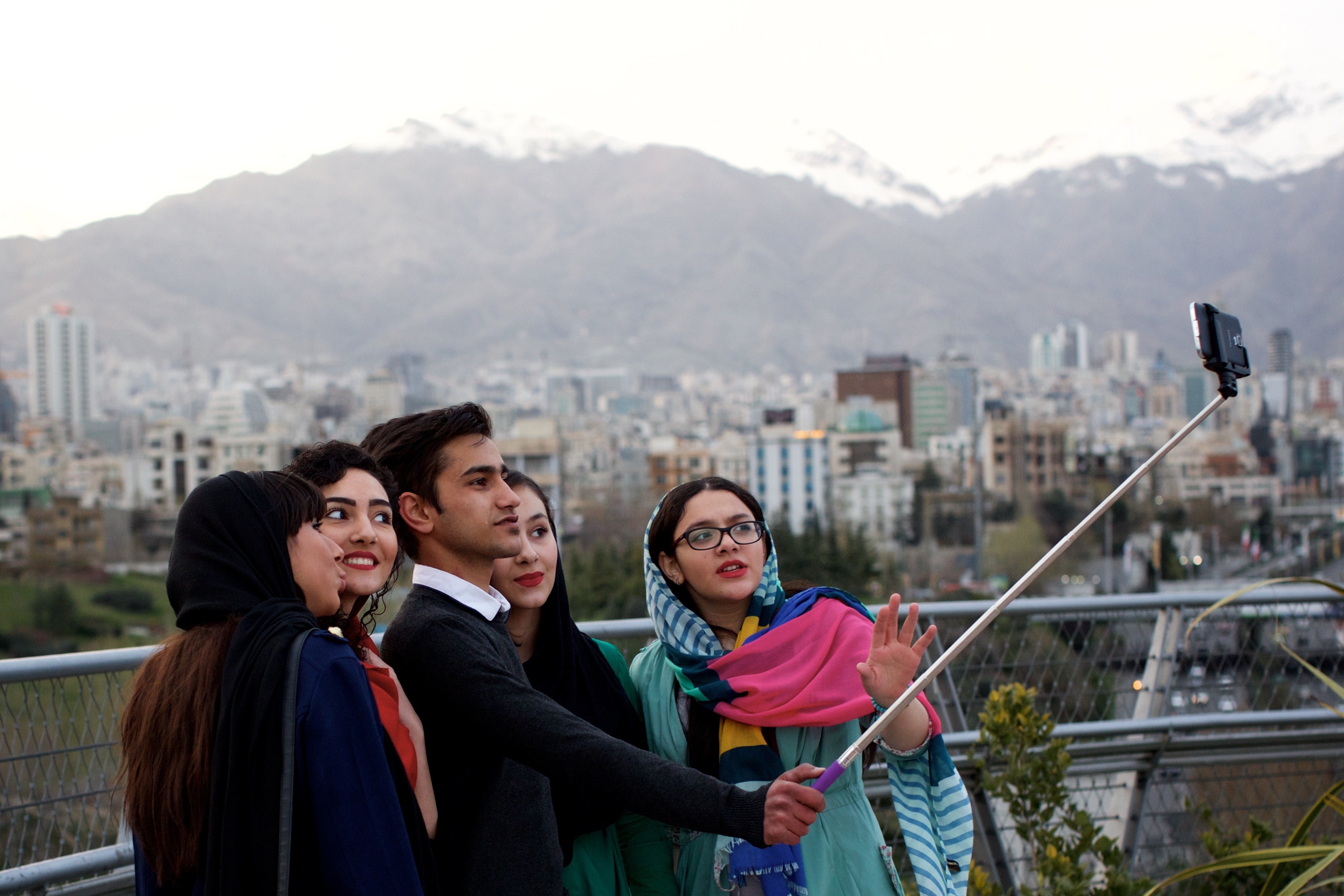 Iranian youths take a selfie on the Tabi'at (Nature) bridge overlooking Tehran on March 25, 2015. (Behrouz Mehri—AFP/Getty Images)