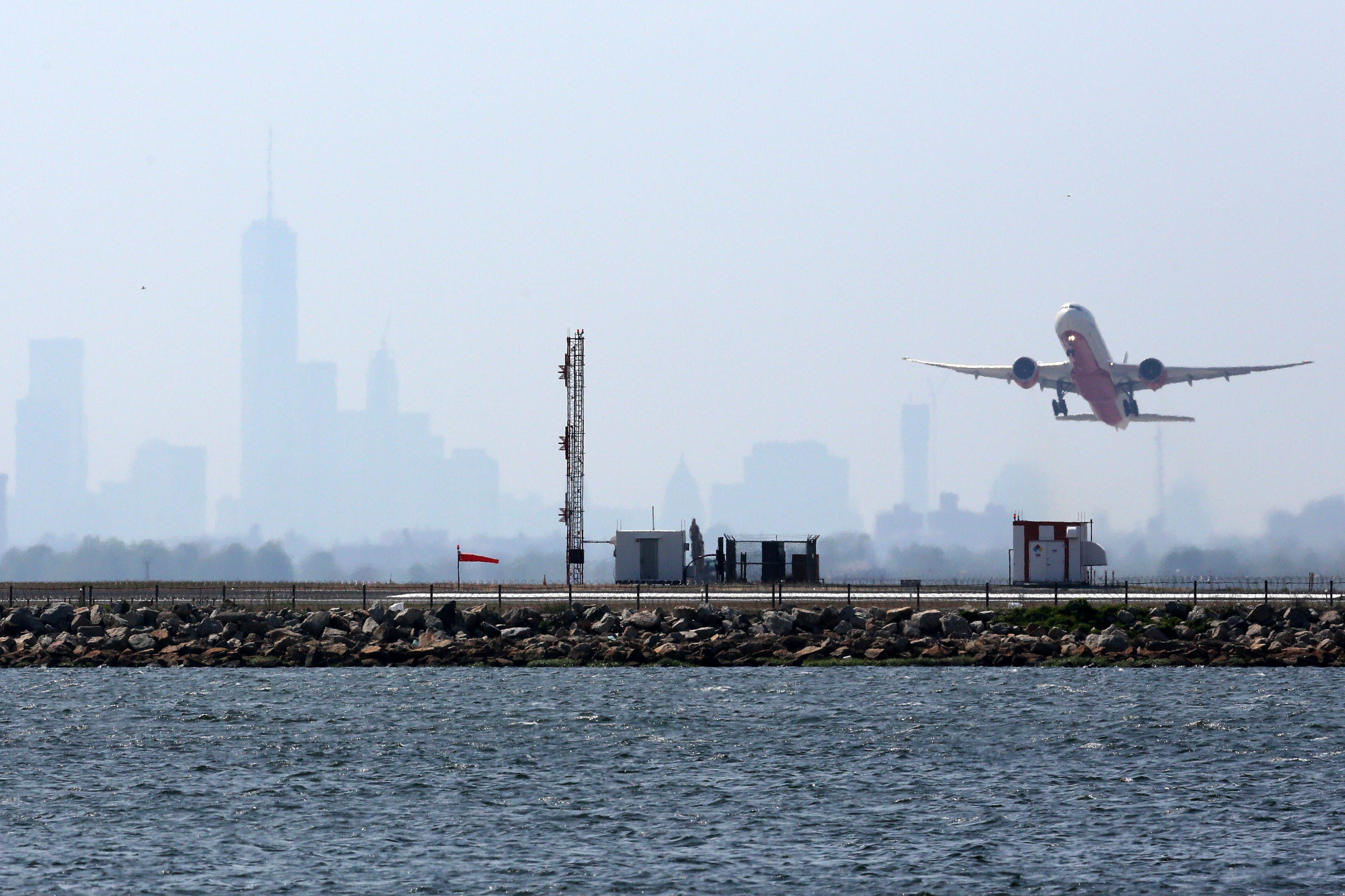 An aircraft takes off from New York's John F. Kennedy Airport on May 25, 2015. (Trevor Collens—AFP/Getty Images)