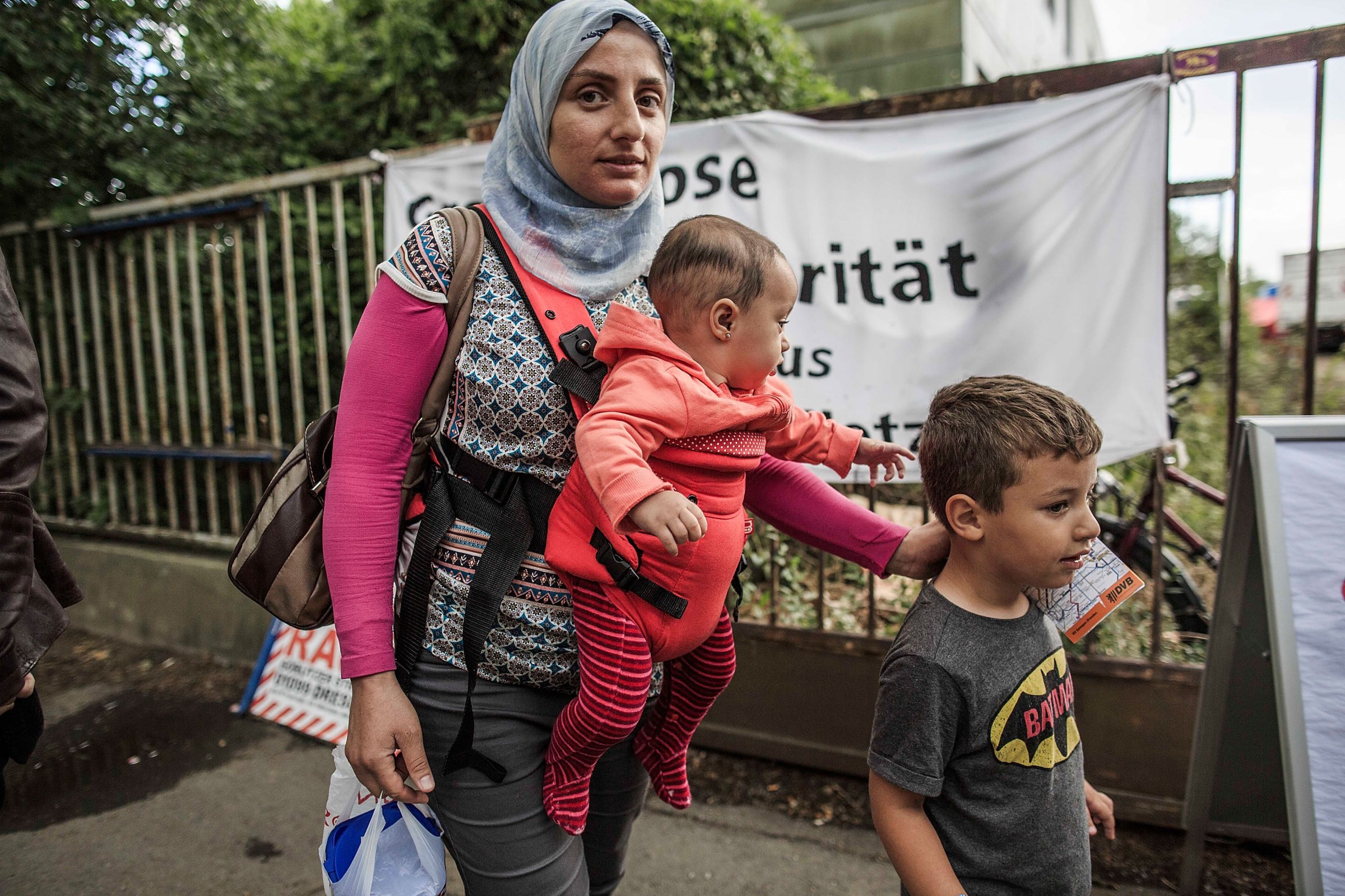 Refugees Arrive In Dresden Amidst Protests