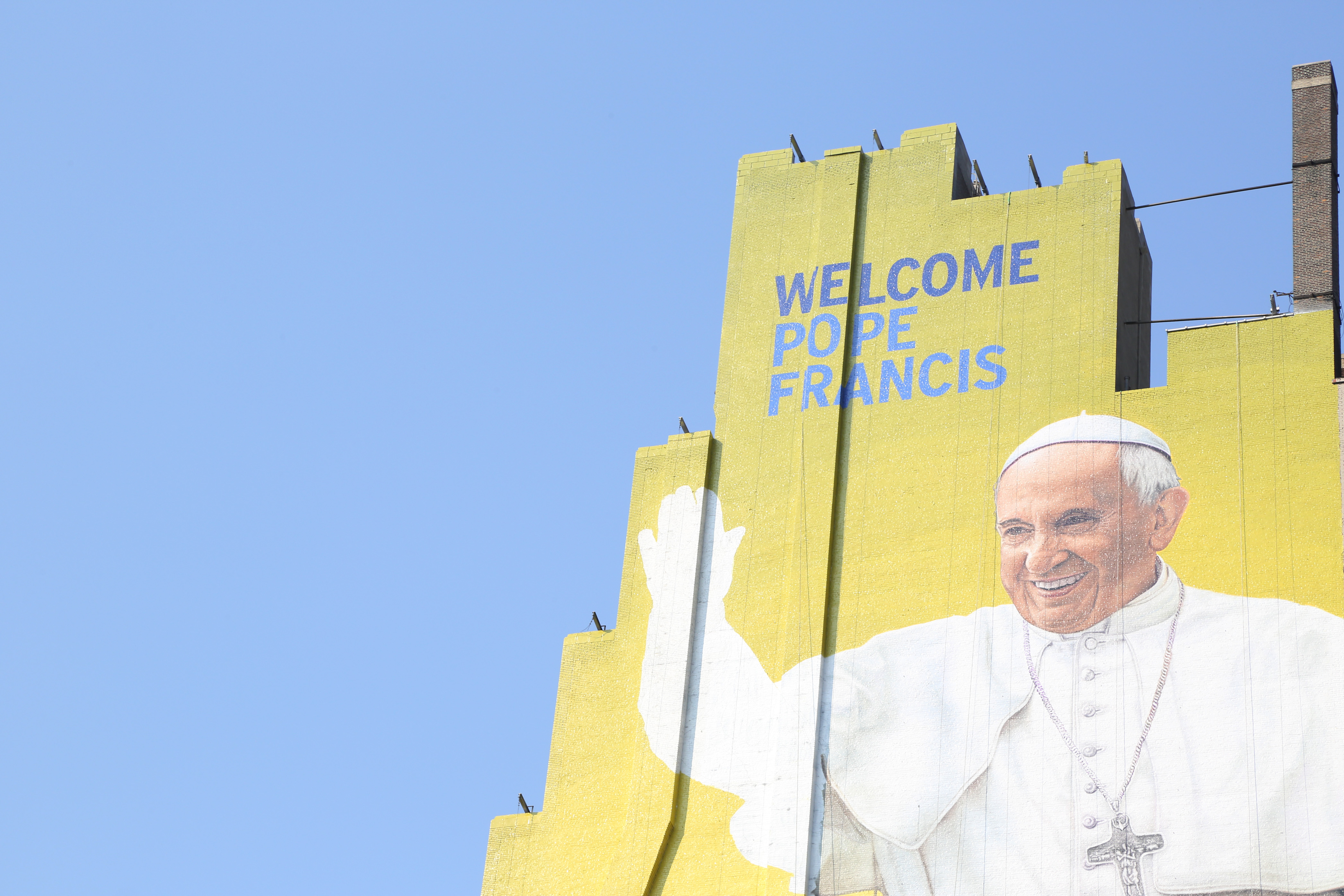 A westside building mural of Pope Francis is almost complete in midtown Manhattan on Sept. 2, 2015 in New York City. (Walter McBride—Getty Images)