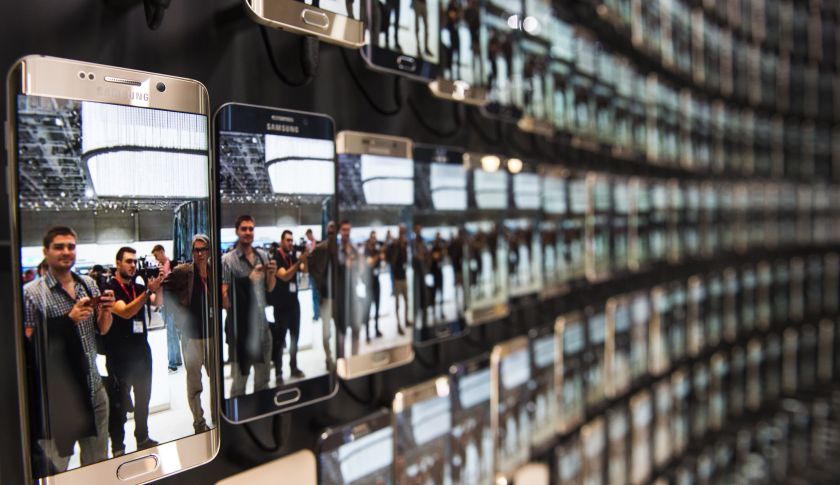 A wall of Samsung Galaxy smartphones. (JOHN MACDOUGALL&mdash;AFP/Getty Images)