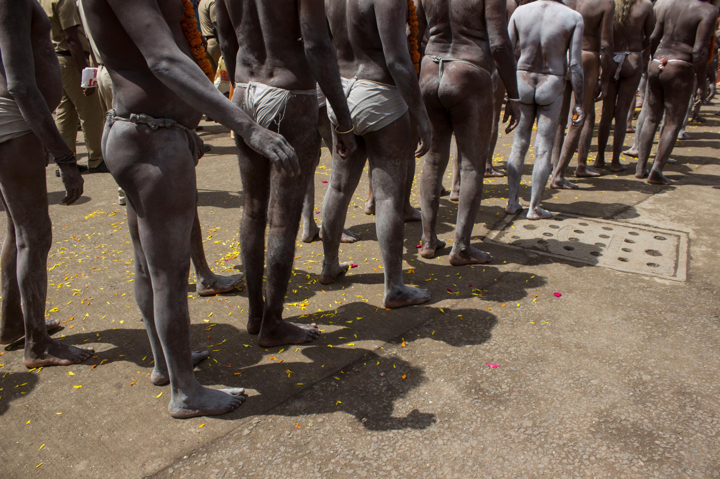 TRIMBAK, NASIK, MAHARASHTRA, INDIA - 2015/08/27: Naga sadhu from Atal Akhada join the Royal Procession in Trimbak.  The Peshwai marks the arrival of the members of an Akhara or sect of sadhus, at the Maha Kumbh Mela venue. Thousands of members of Akhara, including ash-smeared Naga sadhus who are bare-bodied and others who are clad in saffron robes, led the procession. The procession,  includes dozens of beautifully decorated horses, elephants and musical bands playing devotional tunes, as it commenced in Trimbak City . (Photo by Akshay Gupta/Pacific Press/LightRocket via Getty Images)