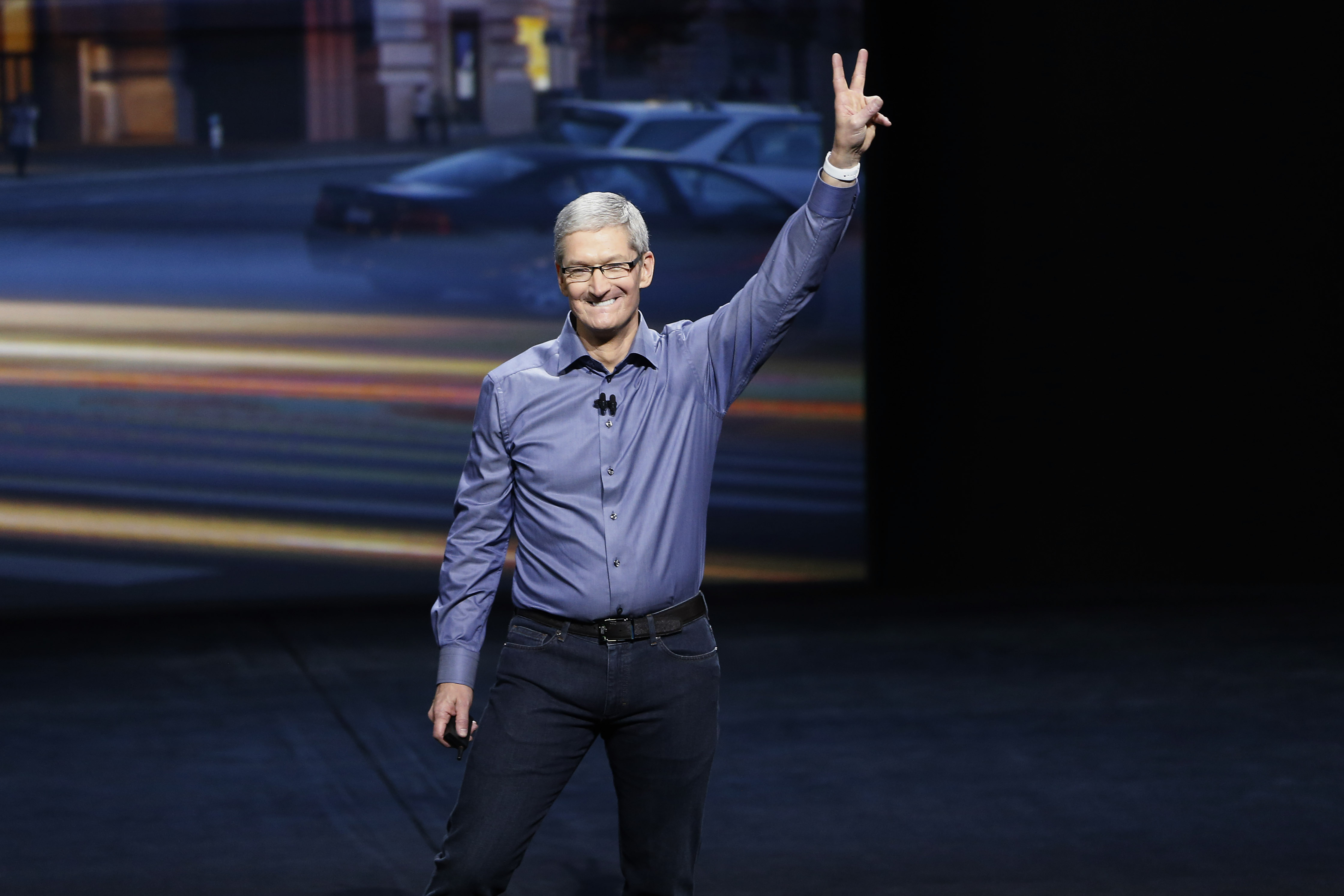 Apple CEO Tim Cook waves as he arrives on stage during an Apple Special Event on at Bill Graham Civic Auditorium September 9, 2015 in San Francisco, California. (Stephen Lam&mdash;Getty Images)