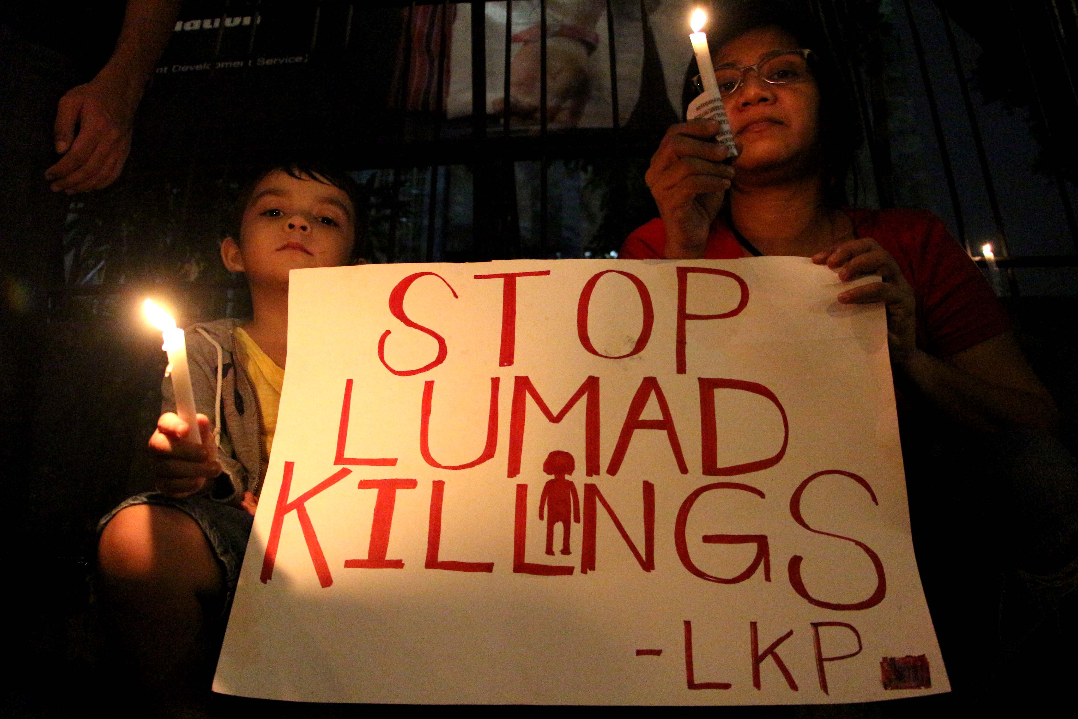 Mourners in Manila join a protest over Lumad killings on Sept. 11, 2015. Many indigenous peoples have been forced to flee their communities (Pacific Press—LightRocket/Getty Images)
