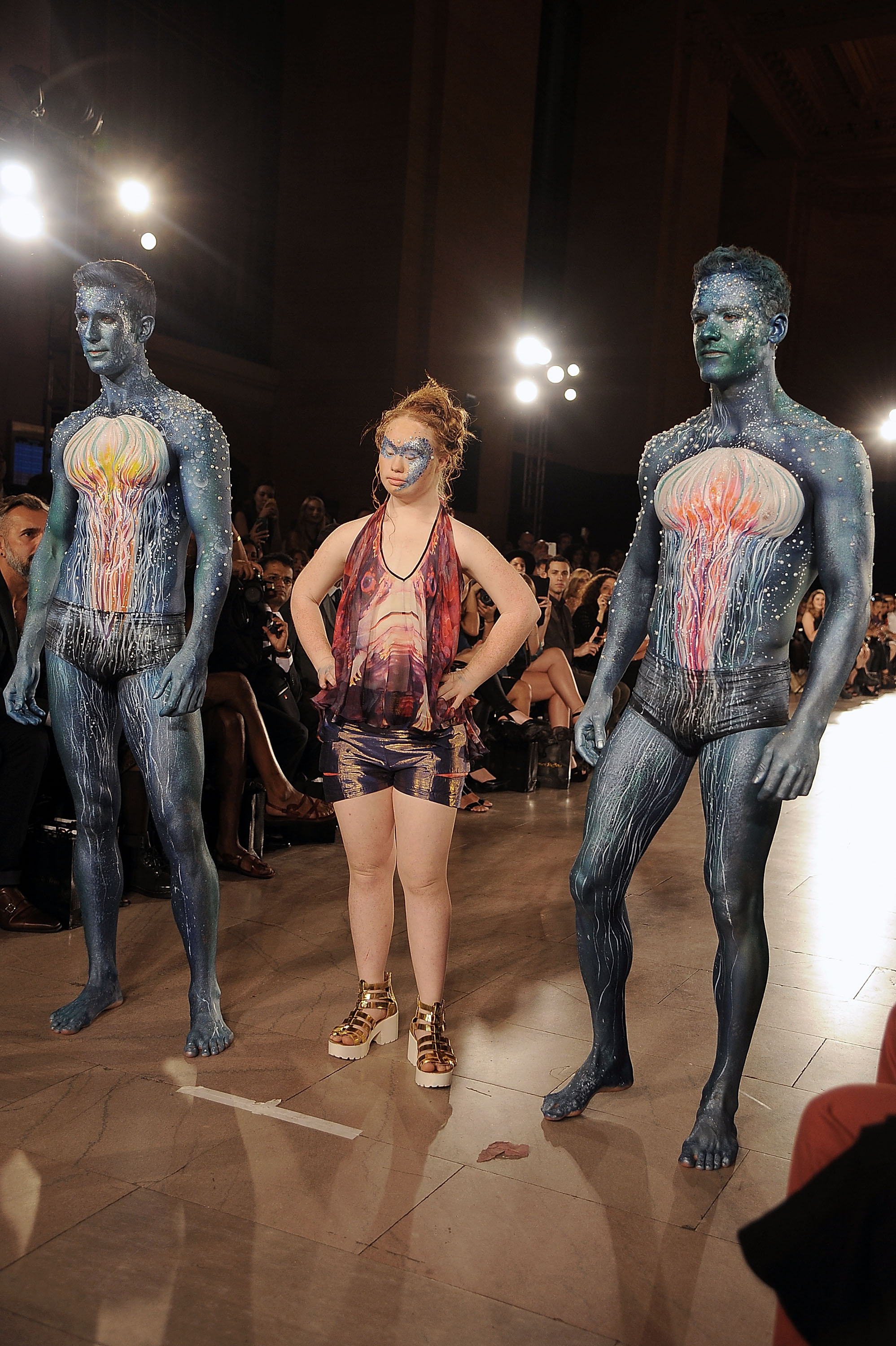 (L-R) Models Jesse Pattison, Madeline Stuart and Ben Pulchinski walk the runway at Hendrik Vermeulen show during Spring 2016 New York Fashion Week at Vanderbilt Hall at Grand Central Terminal on September 13, 2015 in New York City. (Chance Yeh—Getty Images)