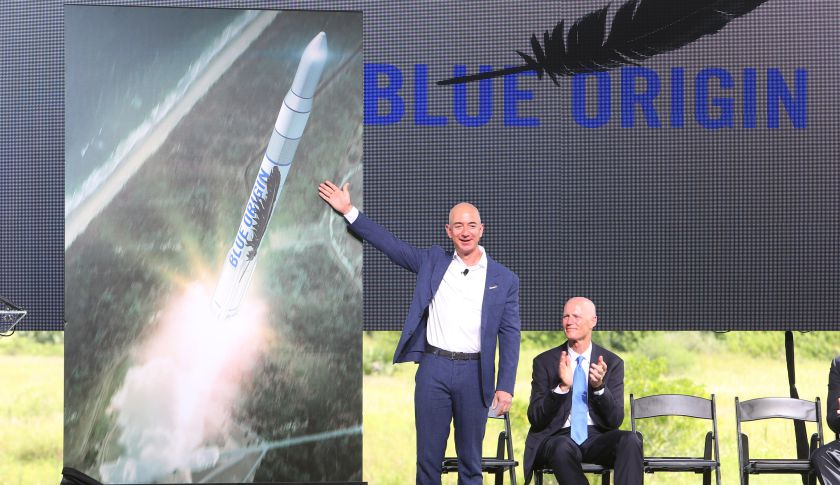 Amazon.com CEO and Blue Origin founder Jeff Bezos, left, debuts a launch vehicle on Tuesday, Sept. 15, 2015. (Orlando Sentinel&mdash;TNS via Getty Images)
