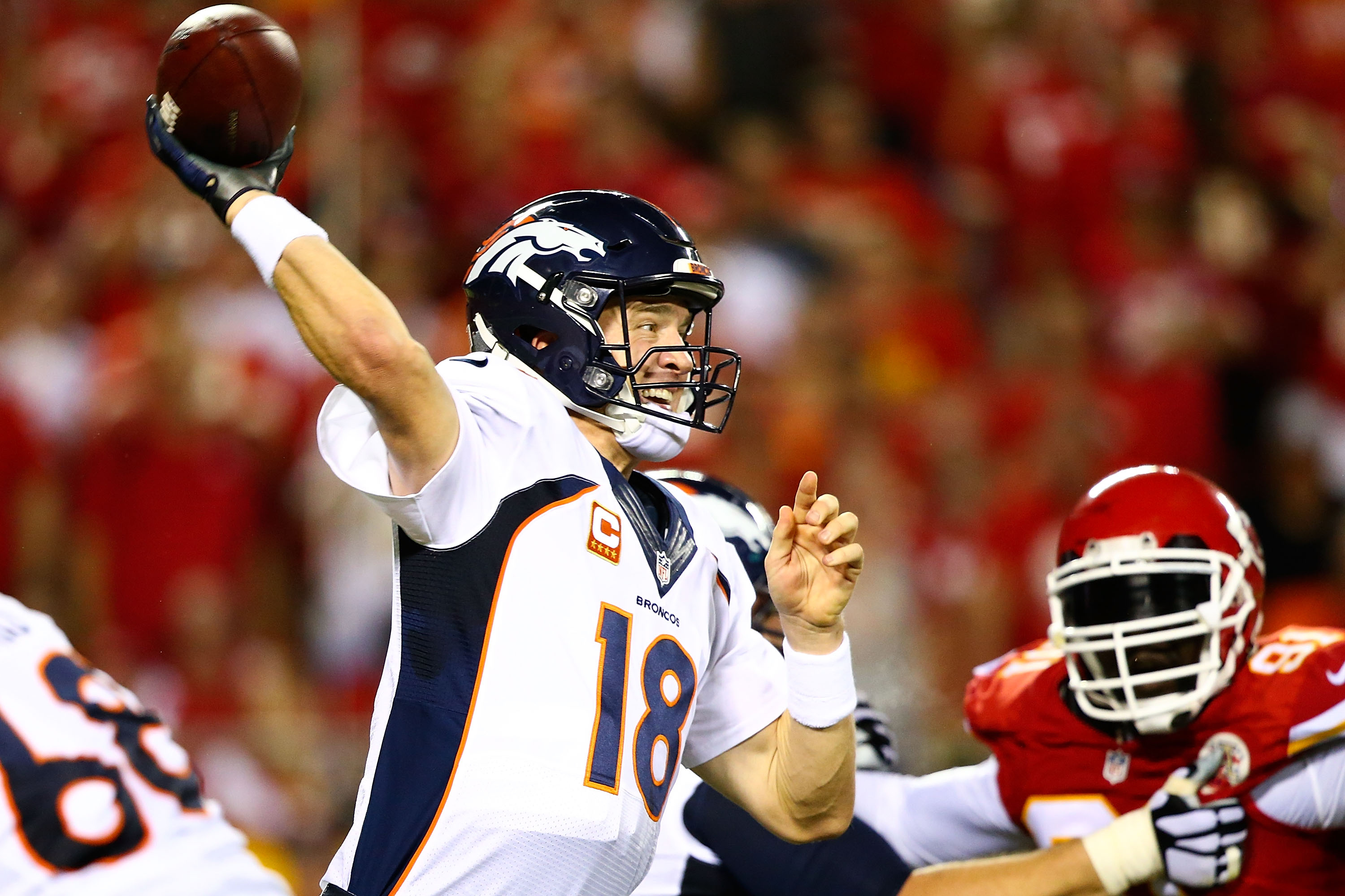 Peyton Manning #18 of the Denver Broncos throws a pass during the game against the Kansas City Chiefs at Arrowhead Stadium on Sept. 17, 2015 in Kansas City, Missouri (Ronald Martinez—Getty Images)