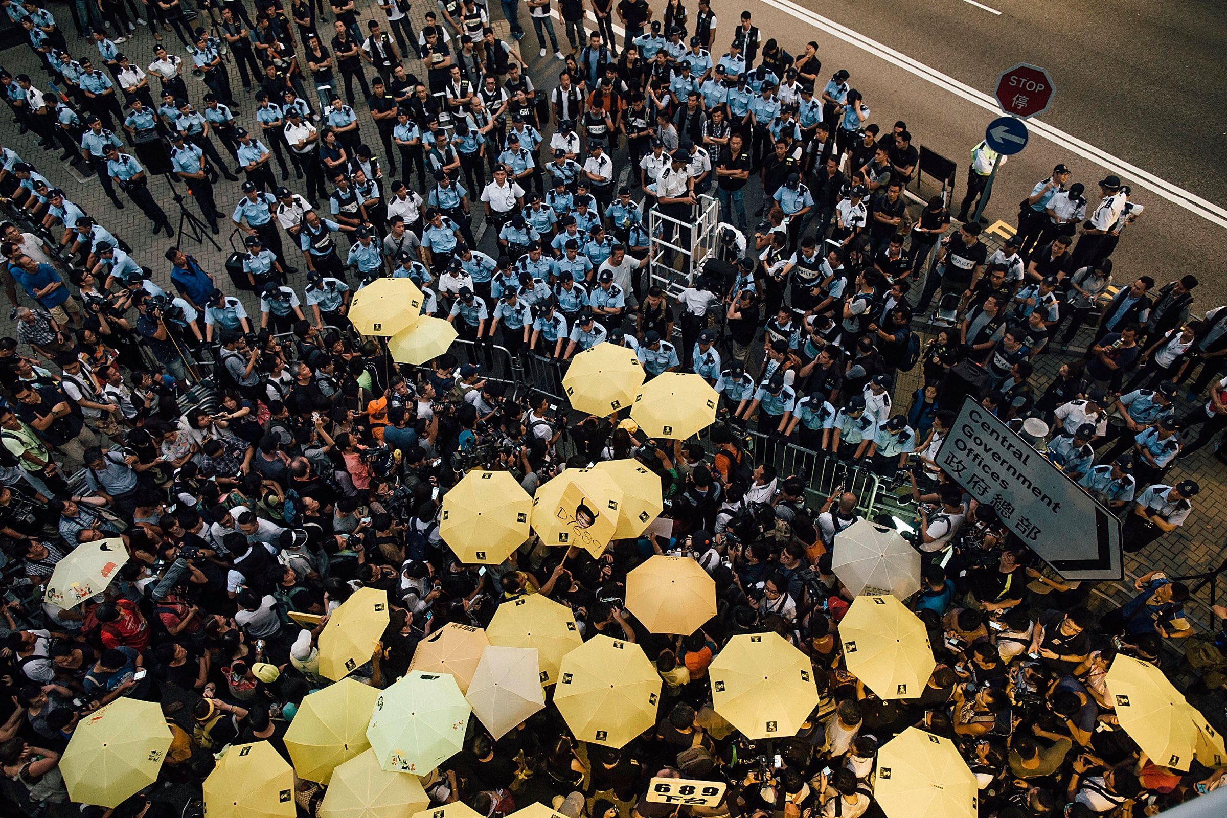 Crowds gather outside of Hong Kong Government Complex at Admiratly district on September 28, 2015 in Hong Kong to mark the first anniversary of the Umbrella Revolution