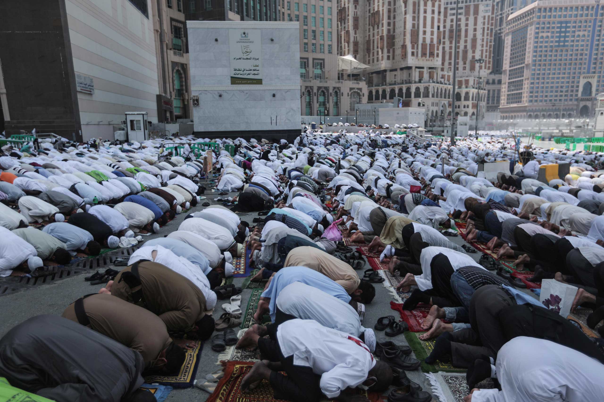 Muslim Pilgrims pray during Friday afternoon prayers outside the Grand Mosque in the holy city of Mecca, on Sep. 18, 2015.