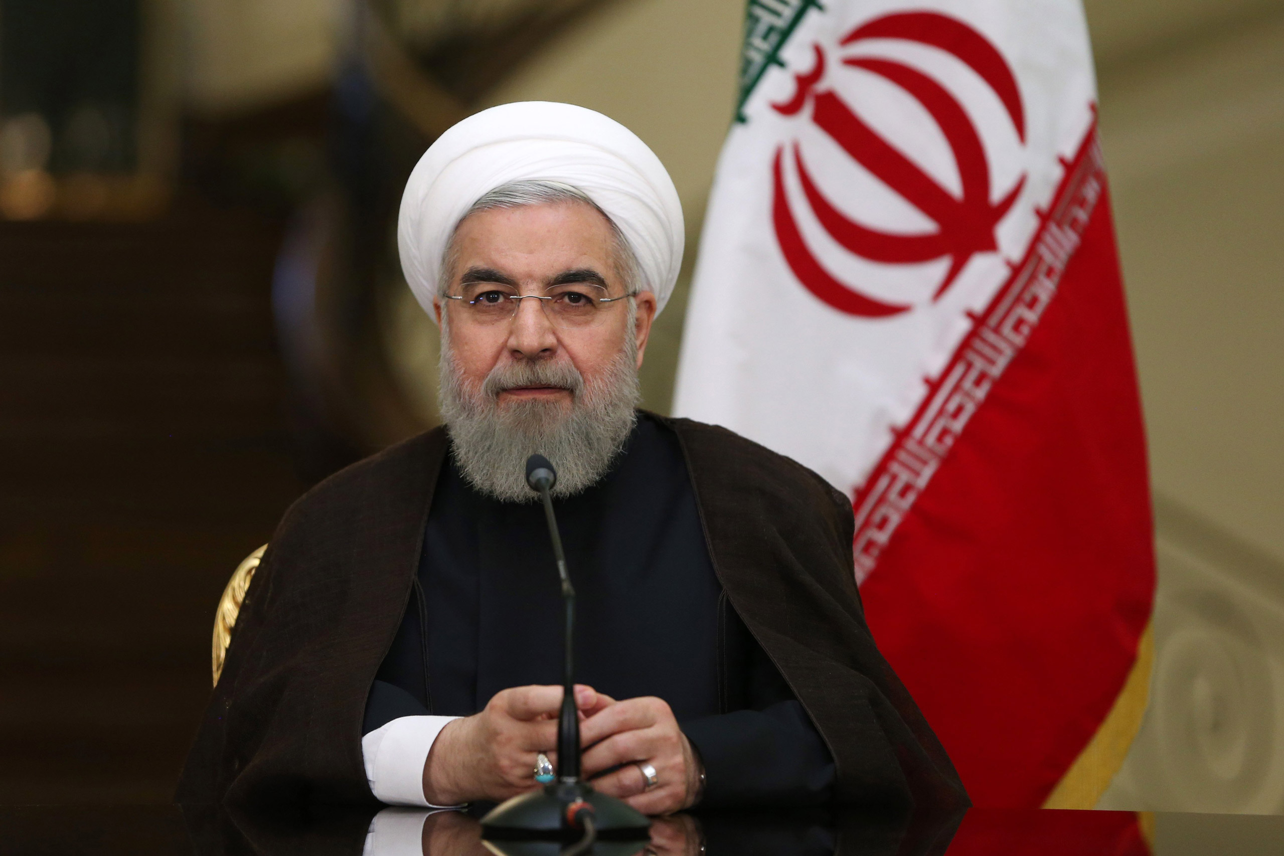 Iranian President Hassan Rouhani speaks with media in a joint press conference with his Austrian counterpart Heinz Fischer after their meeting at the Saadabad Palace in Tehran, Iran, Tuesday, Sept. 8, 2015. Iran's president said on Tuesday that his country is ready to hold talks with the United States and Saudi Arabia on ways to resolve Syria's civil war, providing such negotiations can secure peace and democracy in conflict-torn Syria. (AP Photo/Ebrahim Noroozi)
