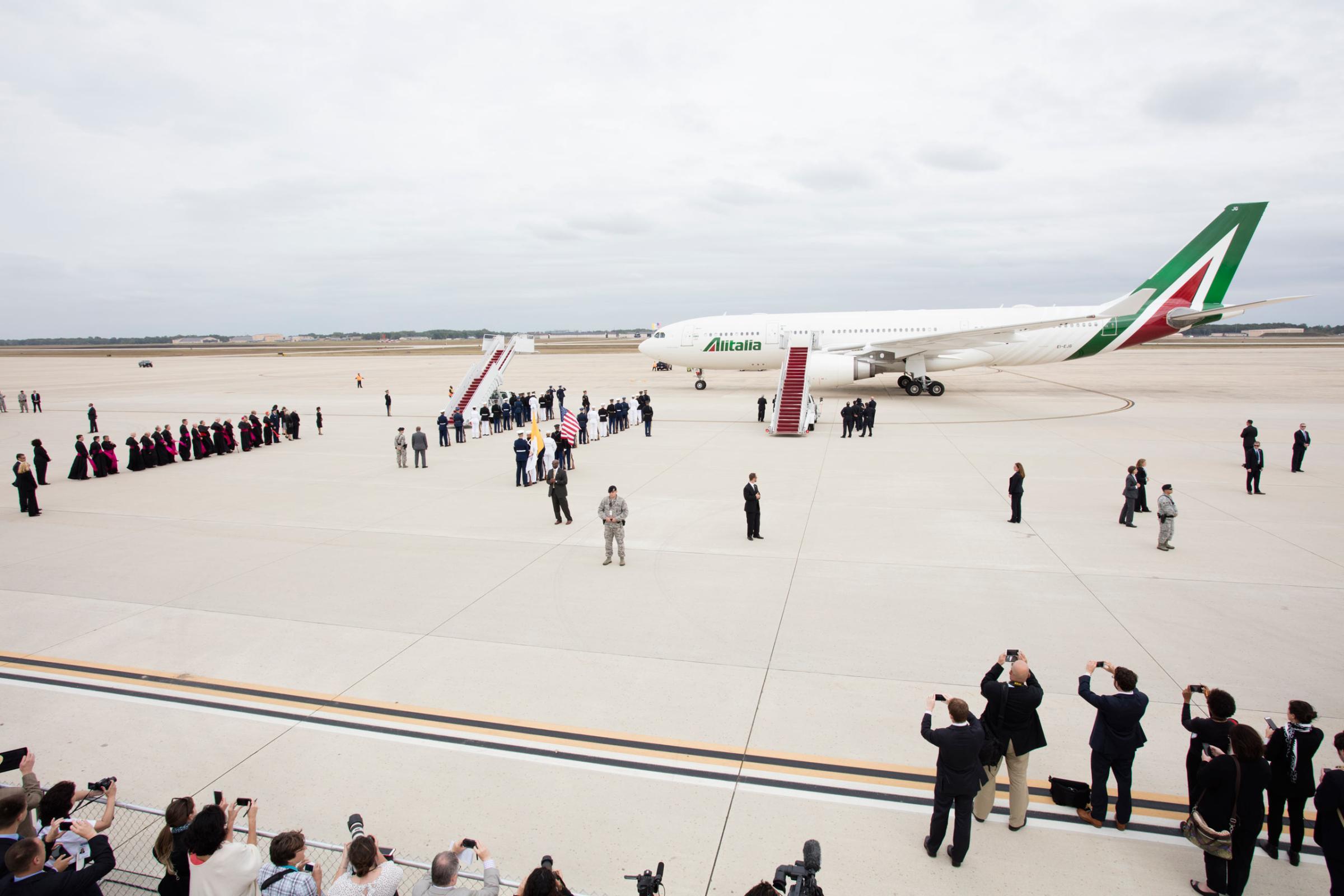 Members of the secret service, clergy, media, government and military personnel, and President Obama and his family , during the arrival of Pope Francis to the USA at Joint Base Andrews , Md., Tuesday, Sept. 22, 2015.Photograph by Tobias Hutzler for TIMEWashington, D.C. Photograph by Tobias Hutzler for TIME