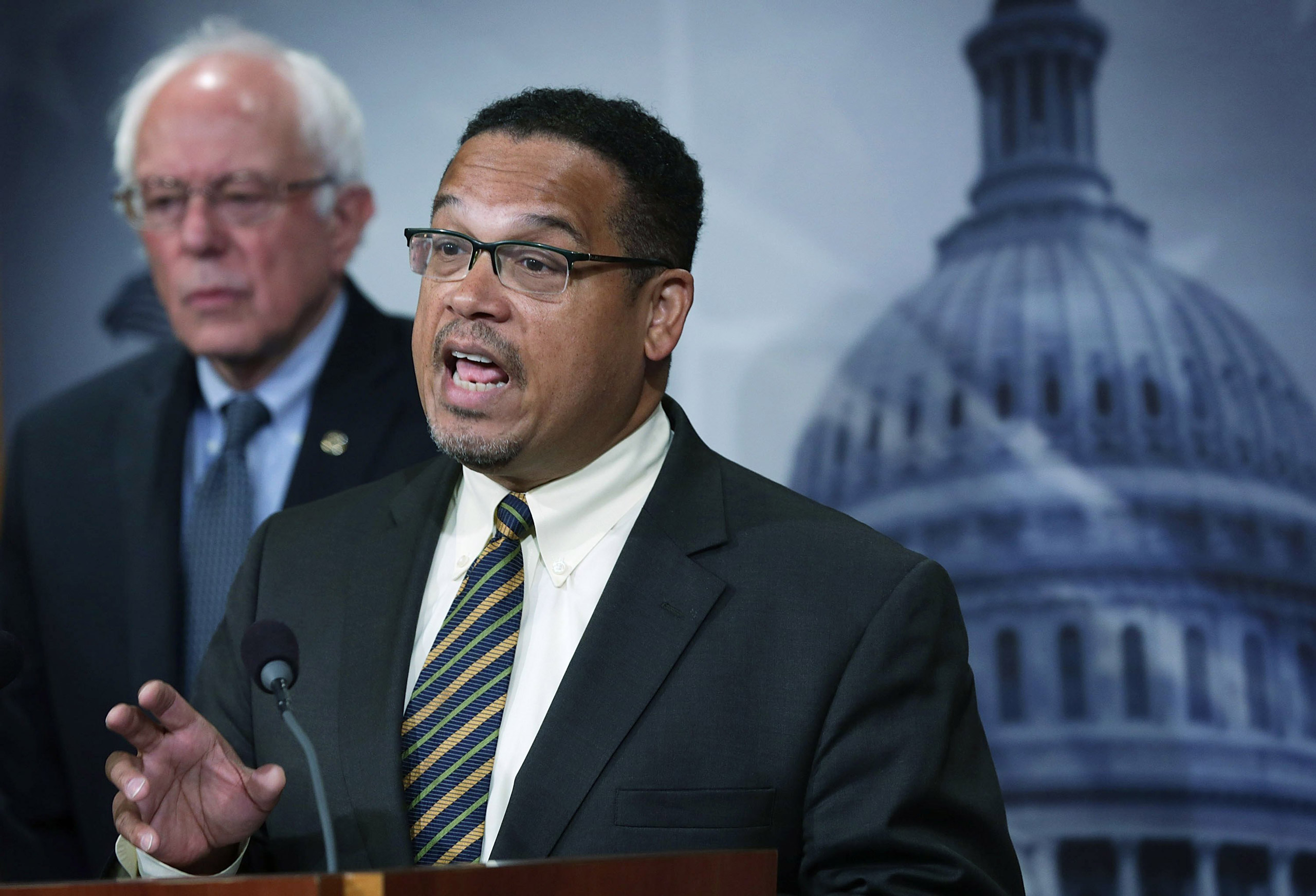 Sen. Bernie Sanders and Rep. Keith Ellison speak to members of the media during a news conference about private prisons on Capitol Hill in Washington on Sept. 17, 2015. (Alex Wong—Getty Images)